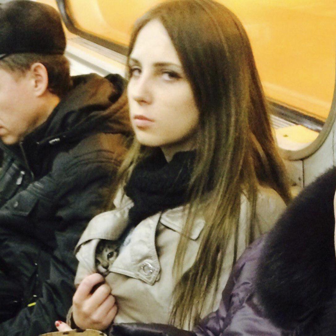 Woman hiding cat in coat template r/MemeTemplatesOfficial