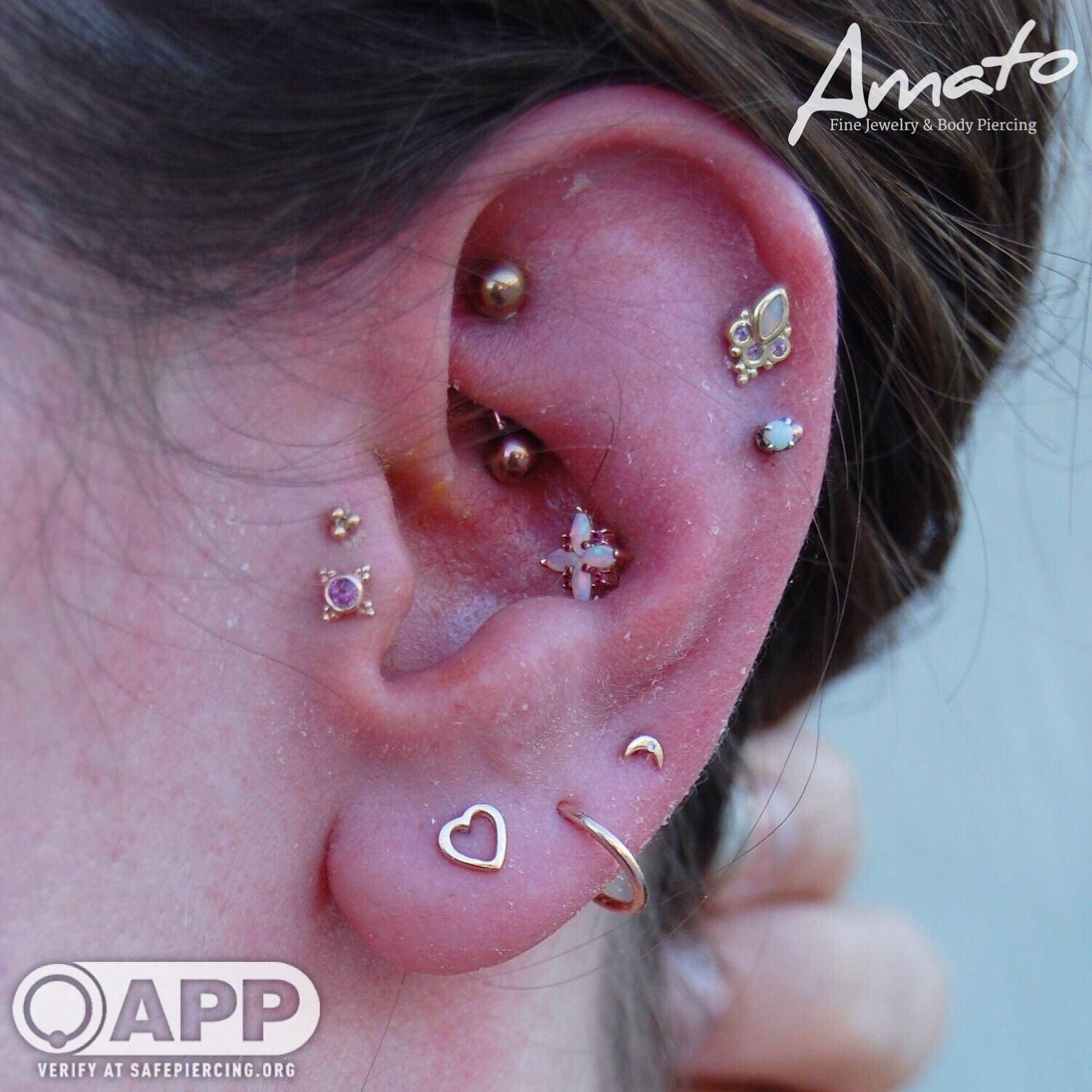 Fun ongoing ear project/curated ear by Joe at Amato Piercing r/piercing