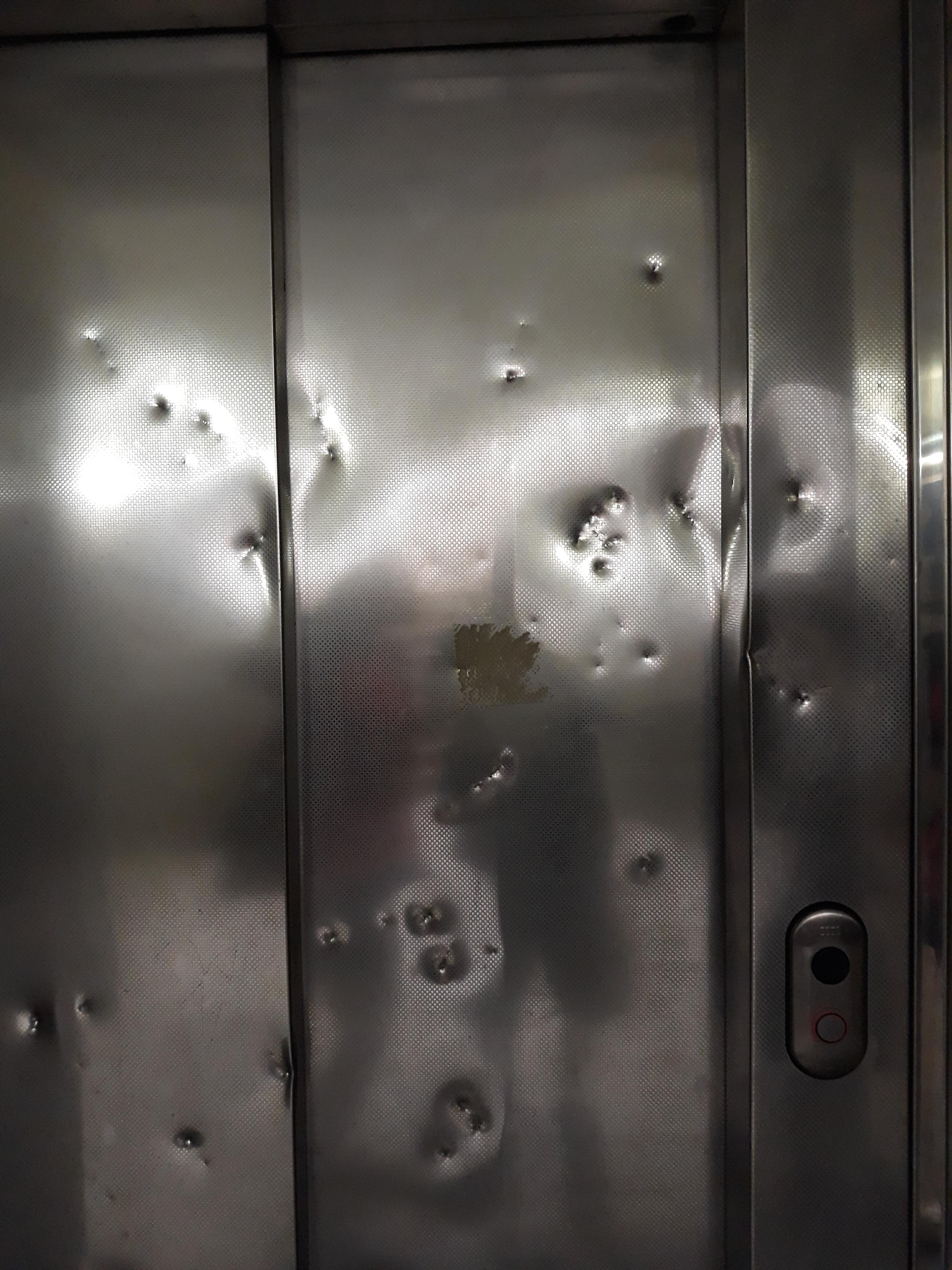 What Is The Hole In An Elevator Door For The Door