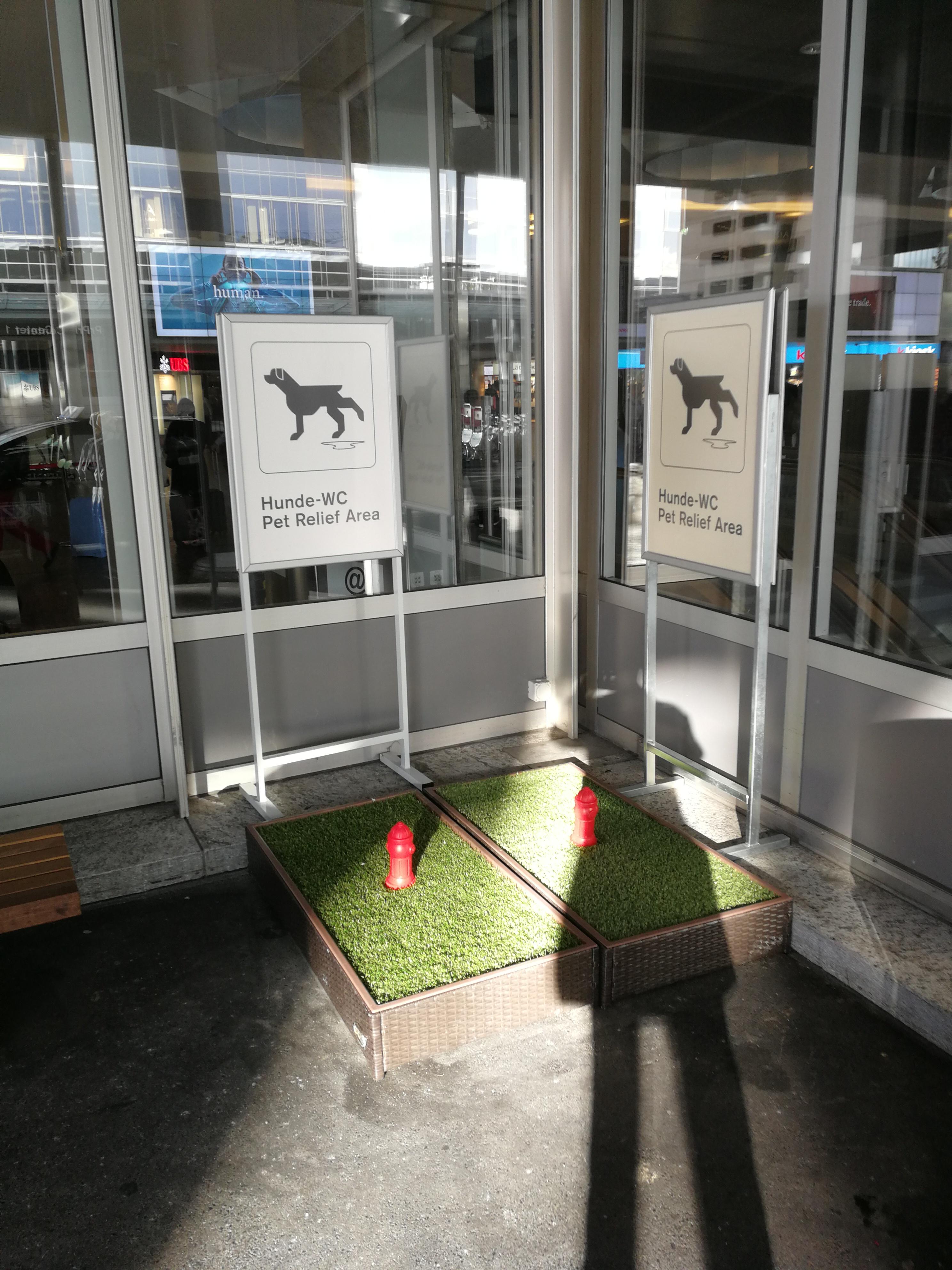 Dog toilets in front of entrance of Zurich airport r/mildlyinteresting