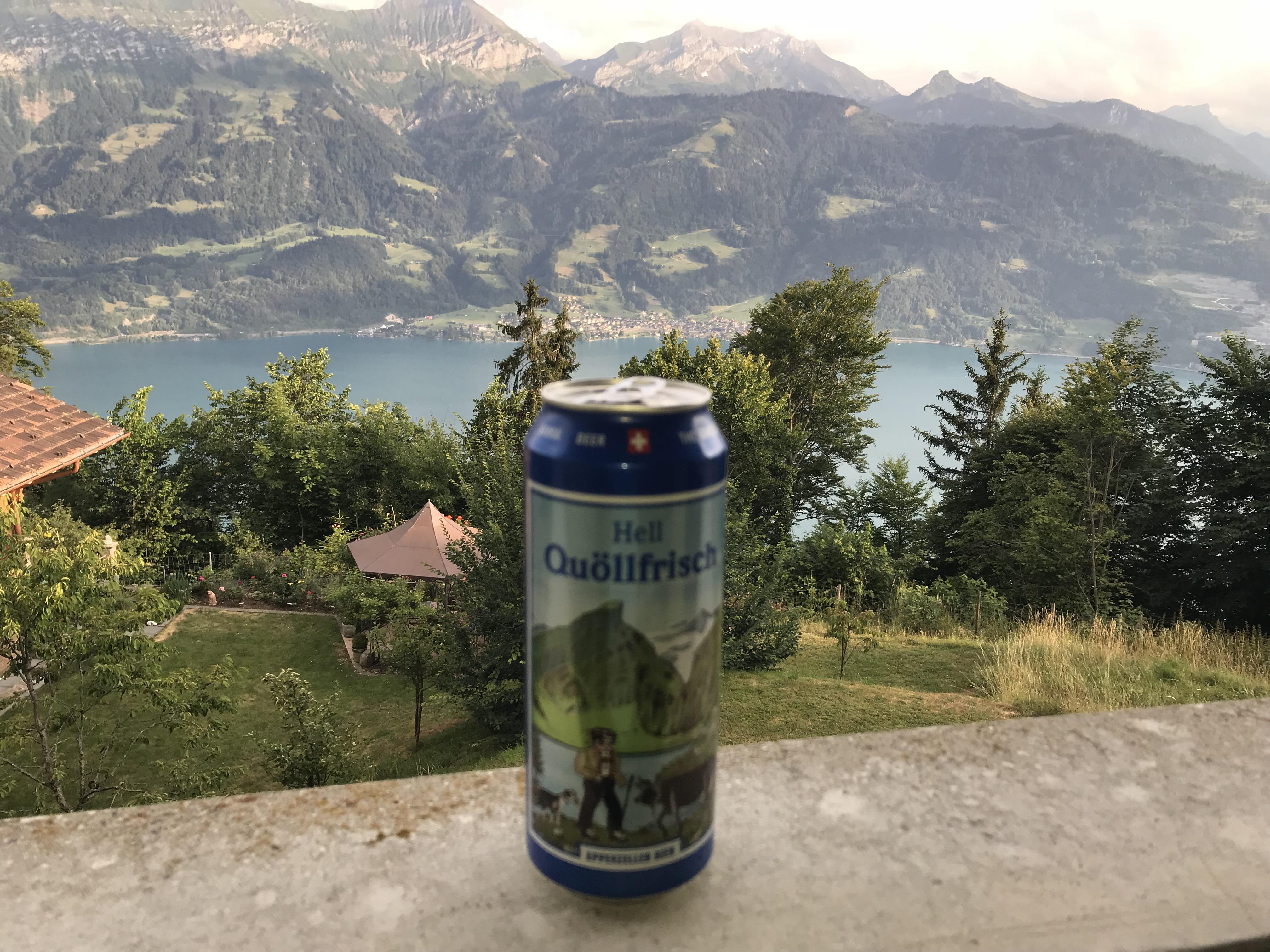 Swiss beer with a view of Interlaken from our hotel balcony r