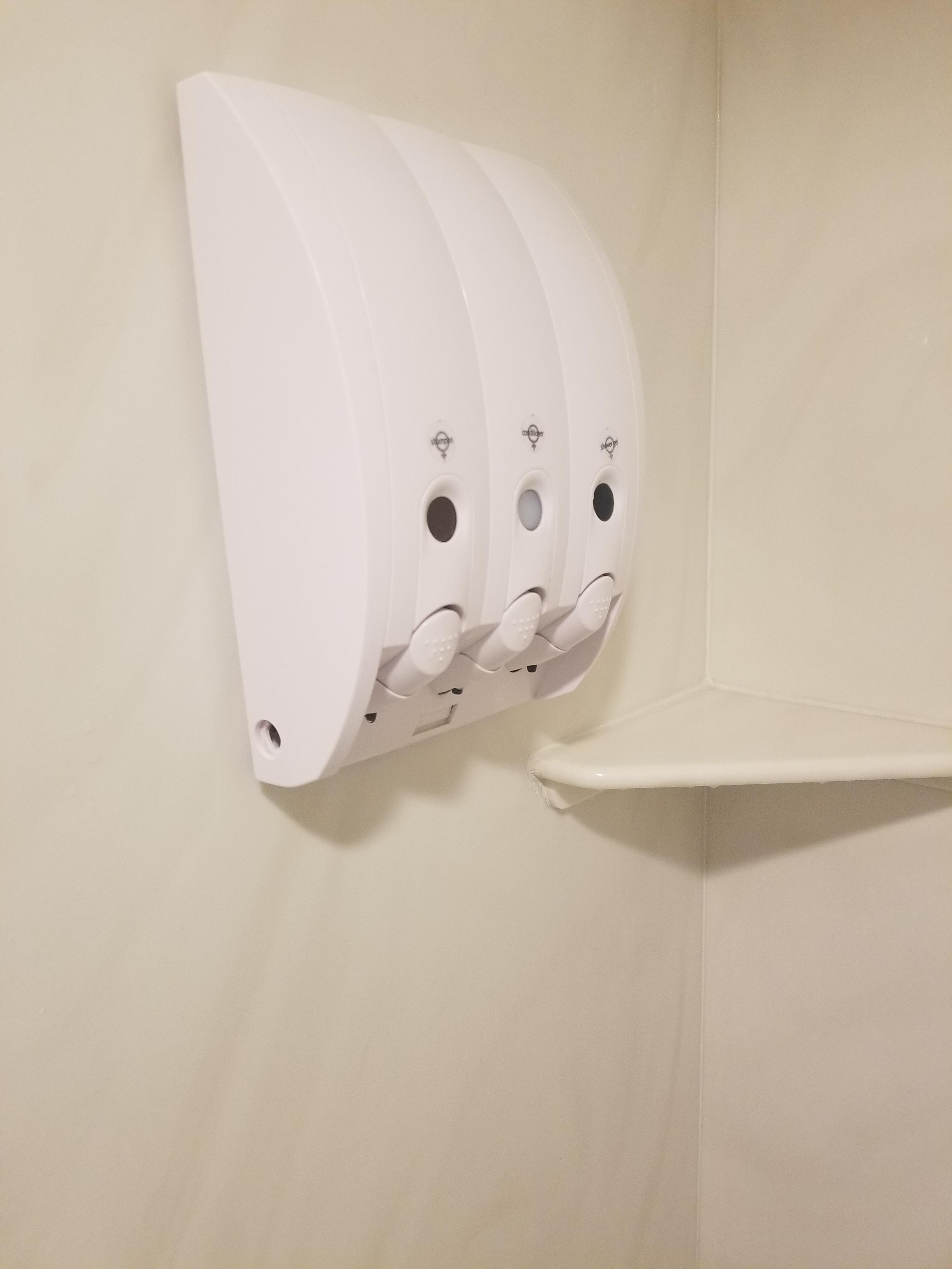 The hotel I'm at has dispensers for shampoo, conditioner, and shower