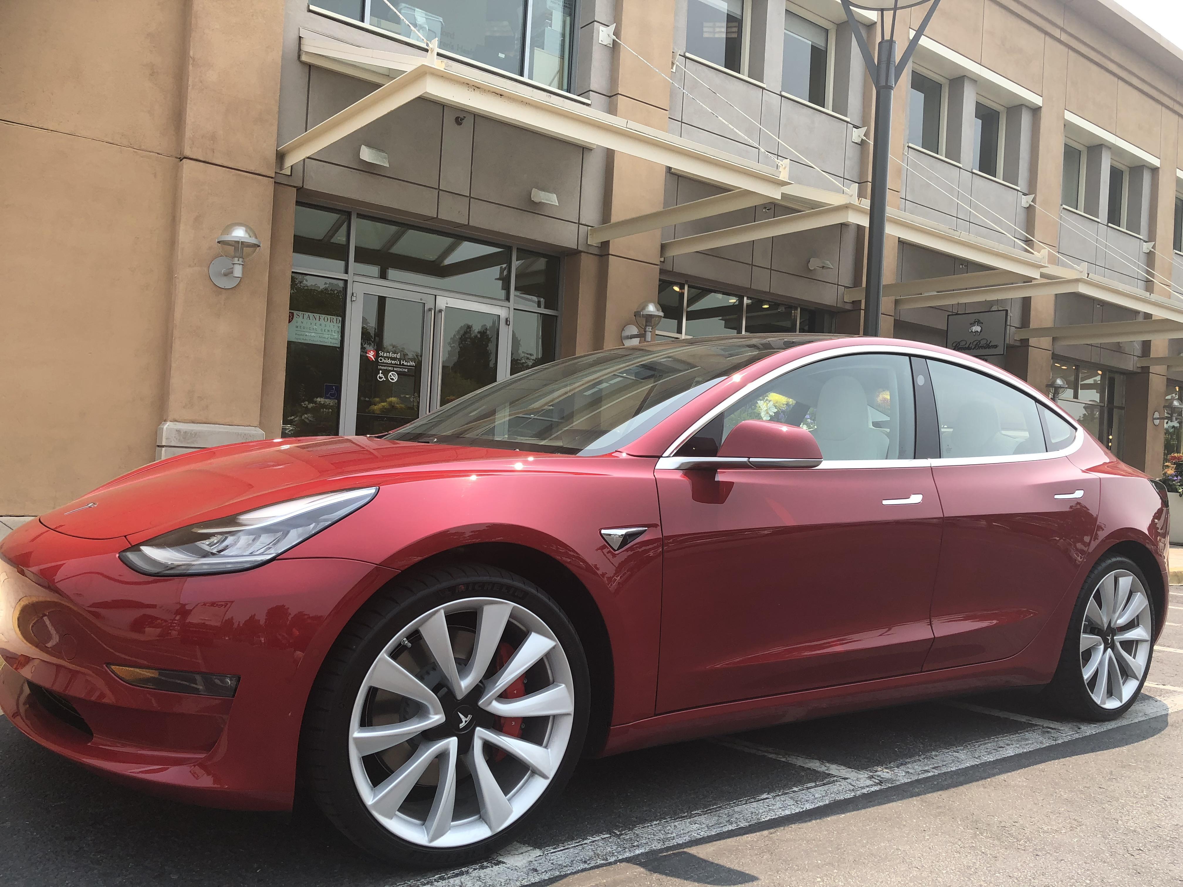 Model 3 Performance, white interior, 20” wheels, lower profile spotted