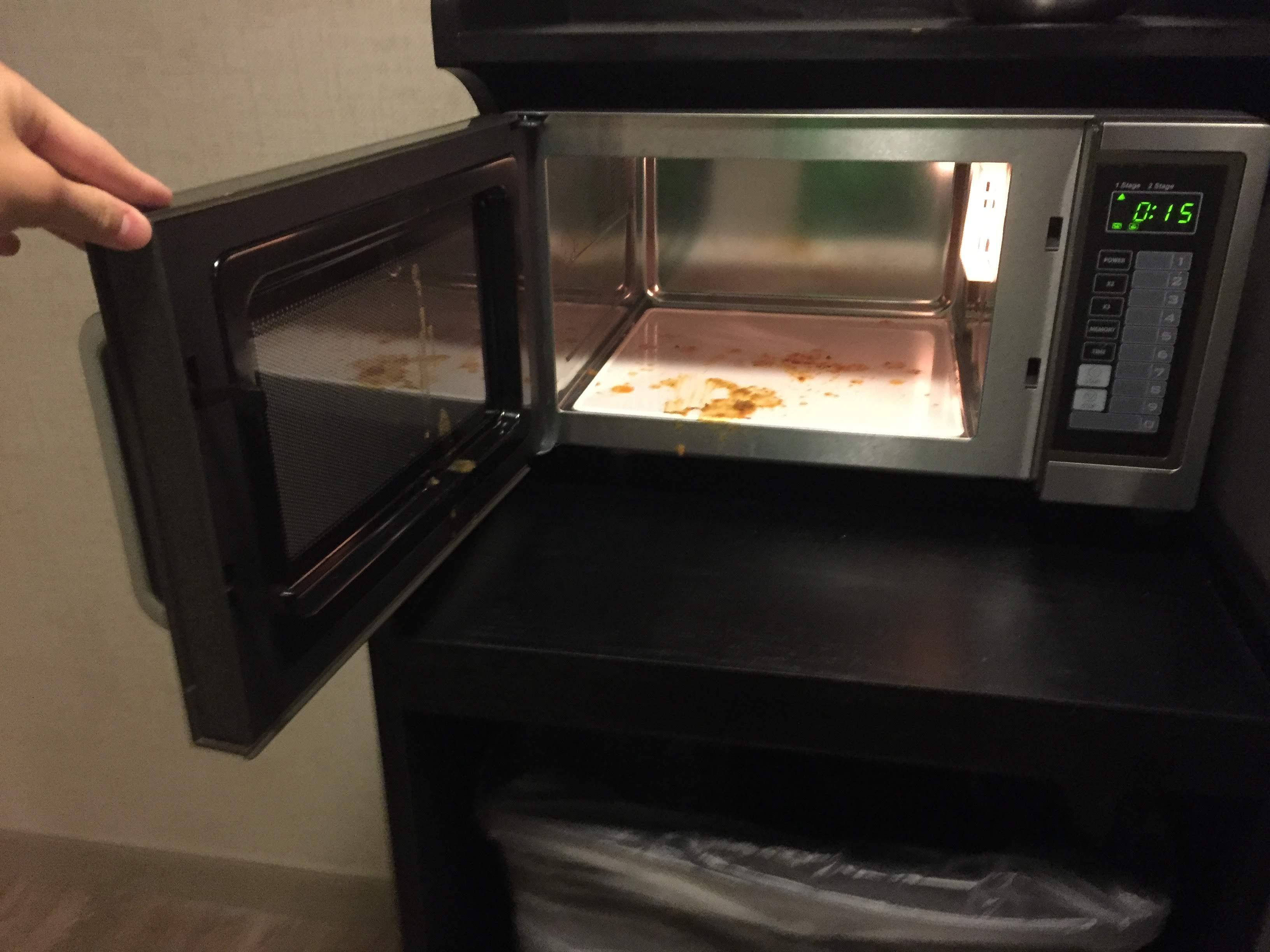 The microwave in the hallway of a 5star hotel. Had been like that for