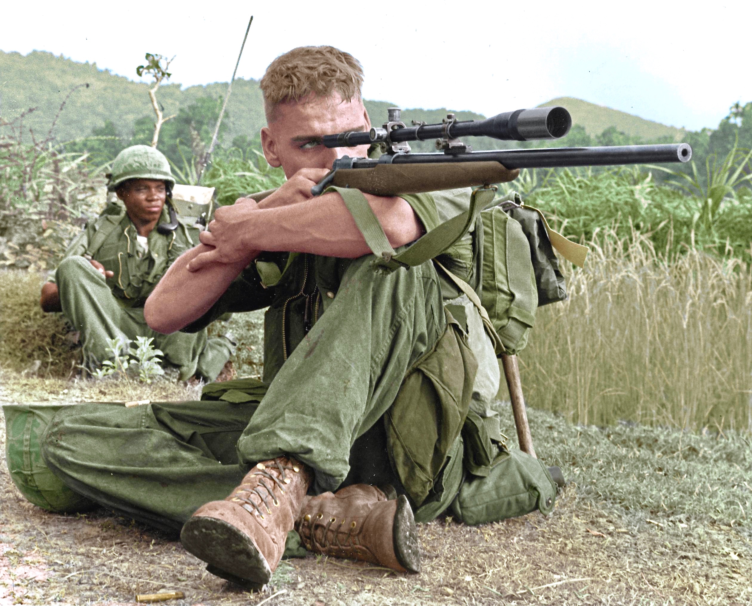 USMC Lance Corporal Dalton B. Gunderson checking the area for VC