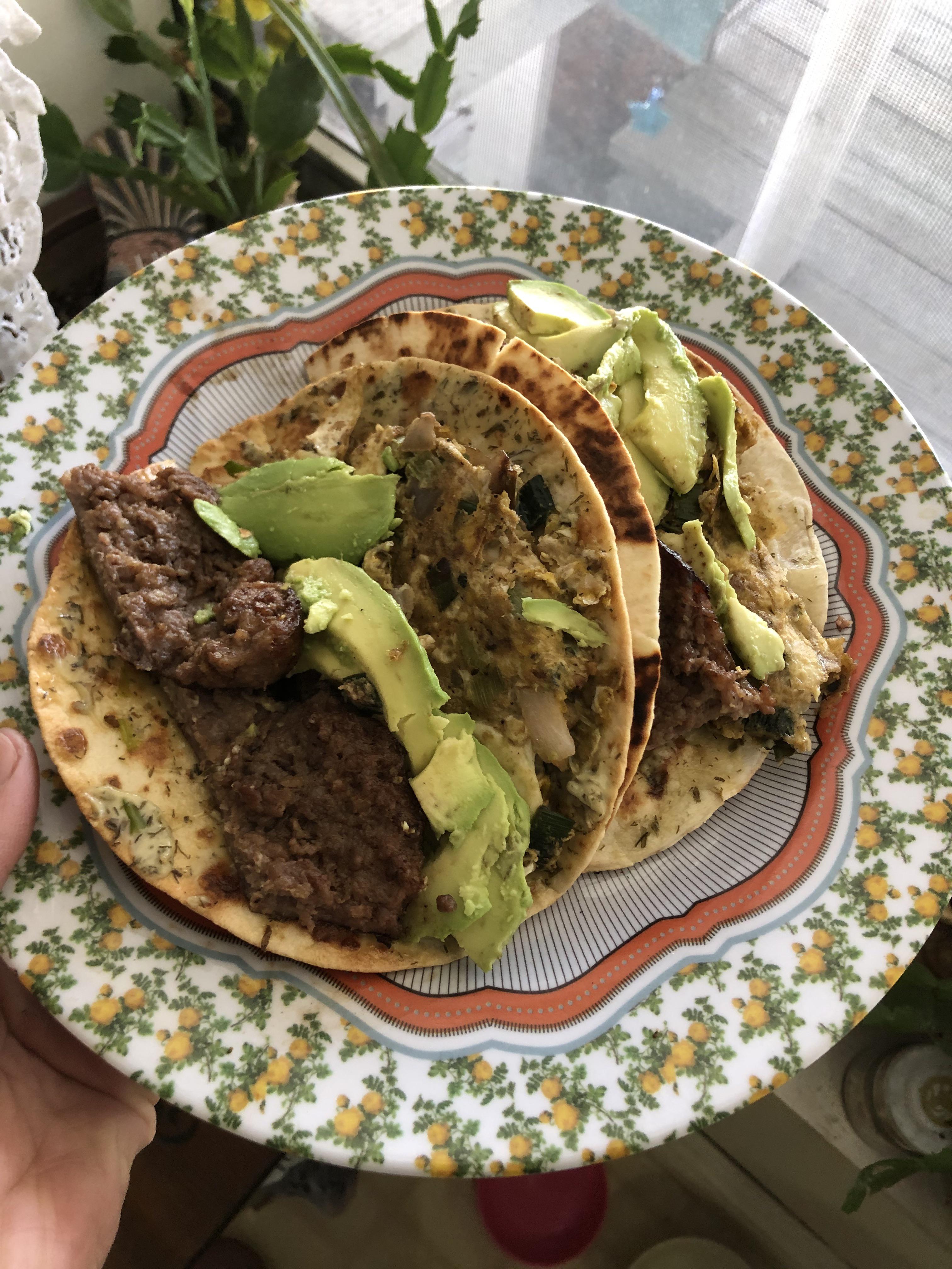 Breakfast tacos de Italian sausage, scrambled egg with leek onion