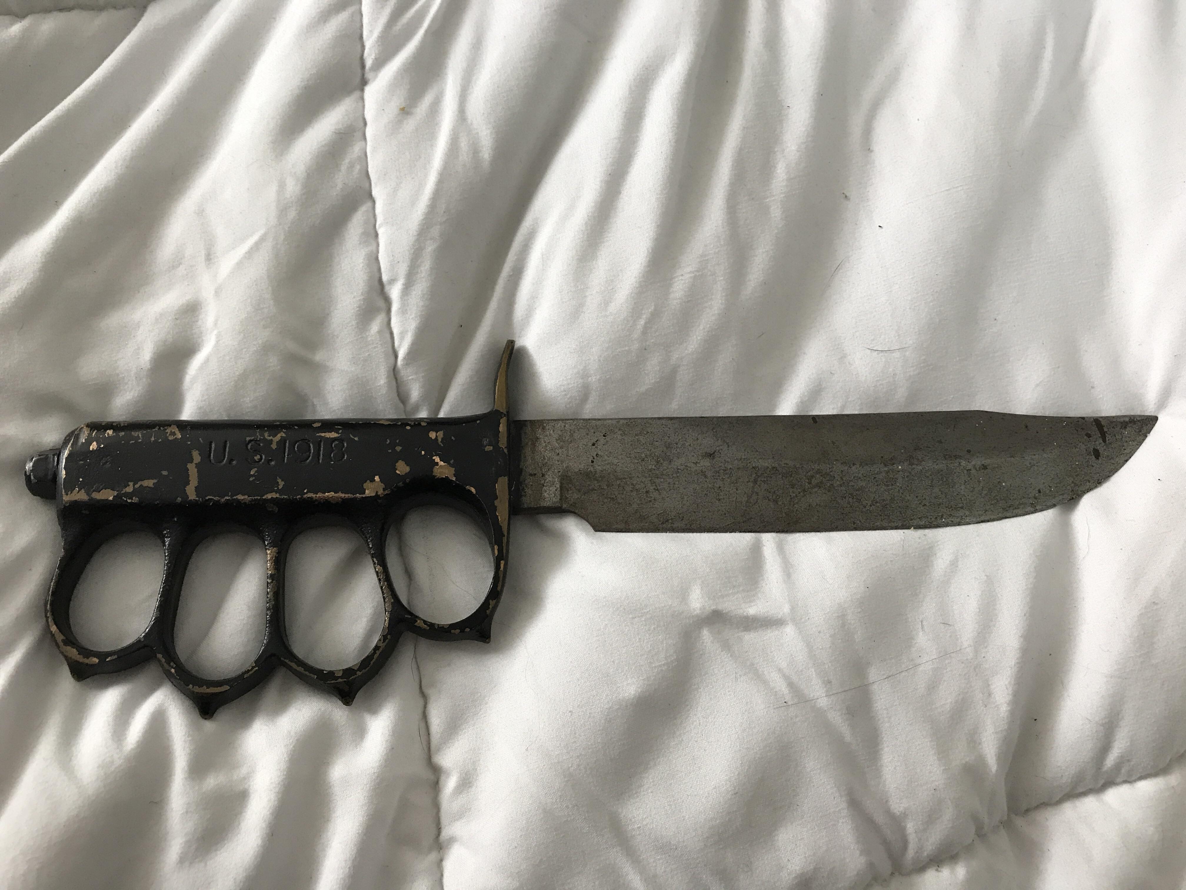 Can anyone identify this? From what I’m told it is legit. r/knives