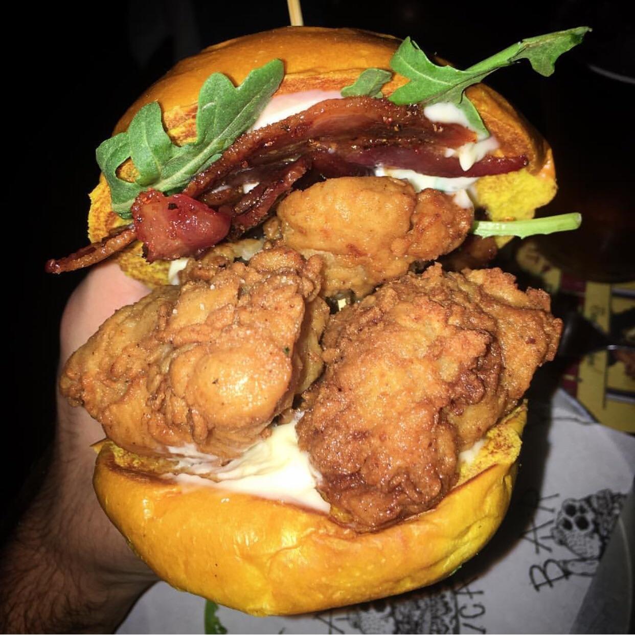 [I Ate] Champagne Fried Chicken burger with truffle aioli, horseradish leaf, bacon on a golden