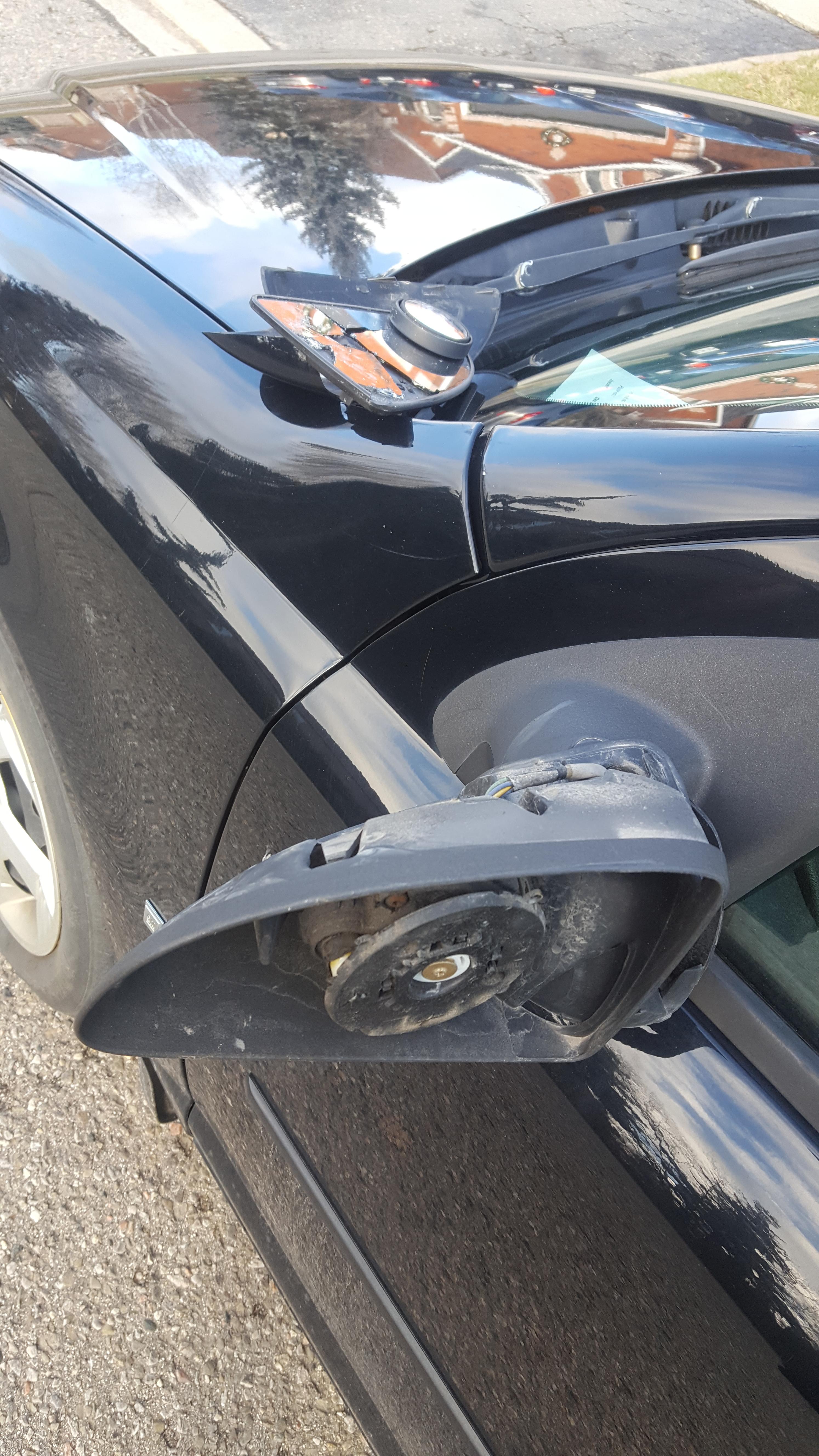 Someone smashed my side mirror last night. Happy new years! r