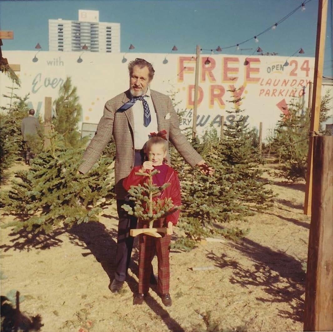 Vincent Price and his daughter Victoria picking out a Charlie Brown