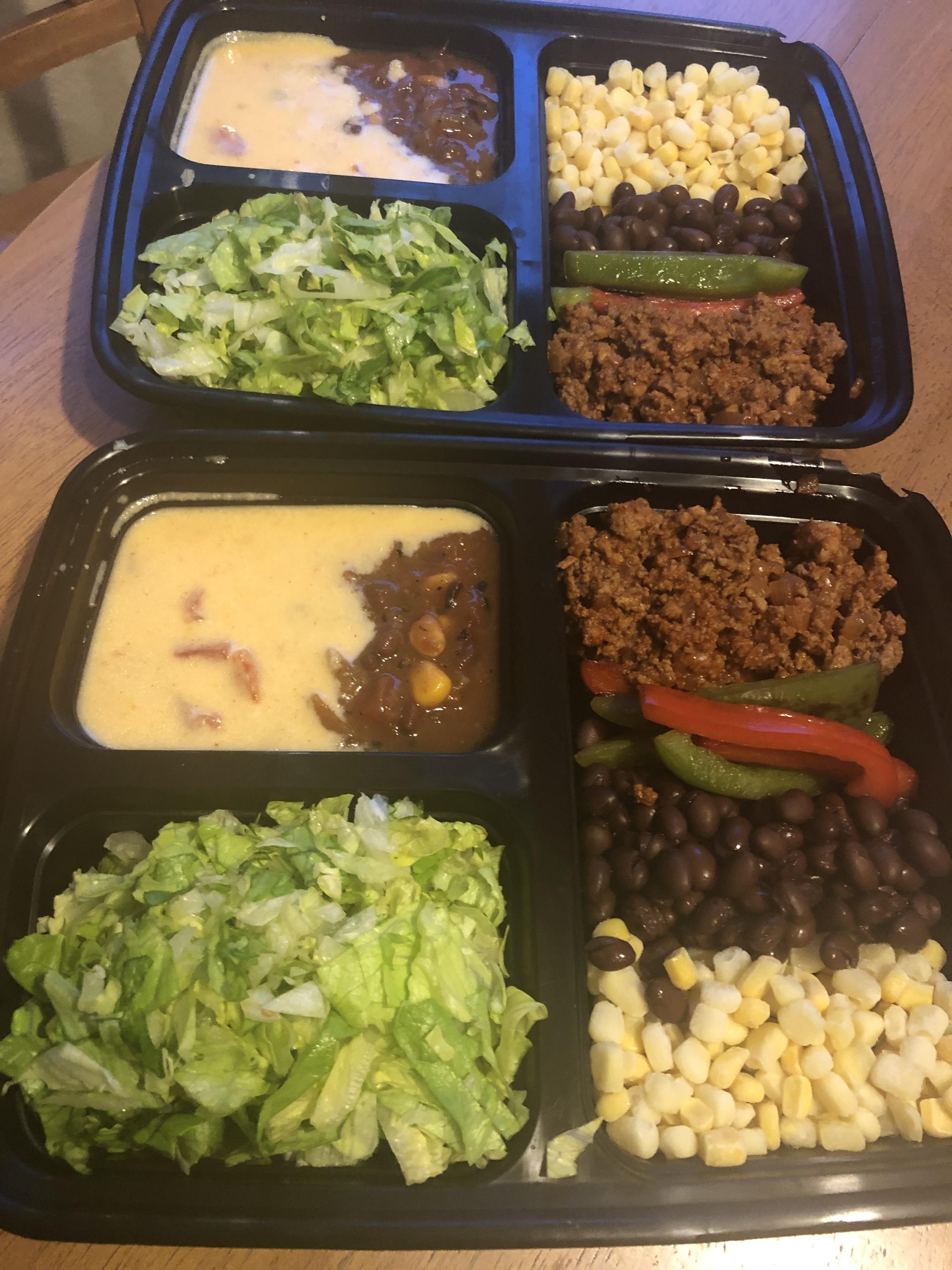 Burrito bowls with ground turkey taco meat, salsa, and homemade queso