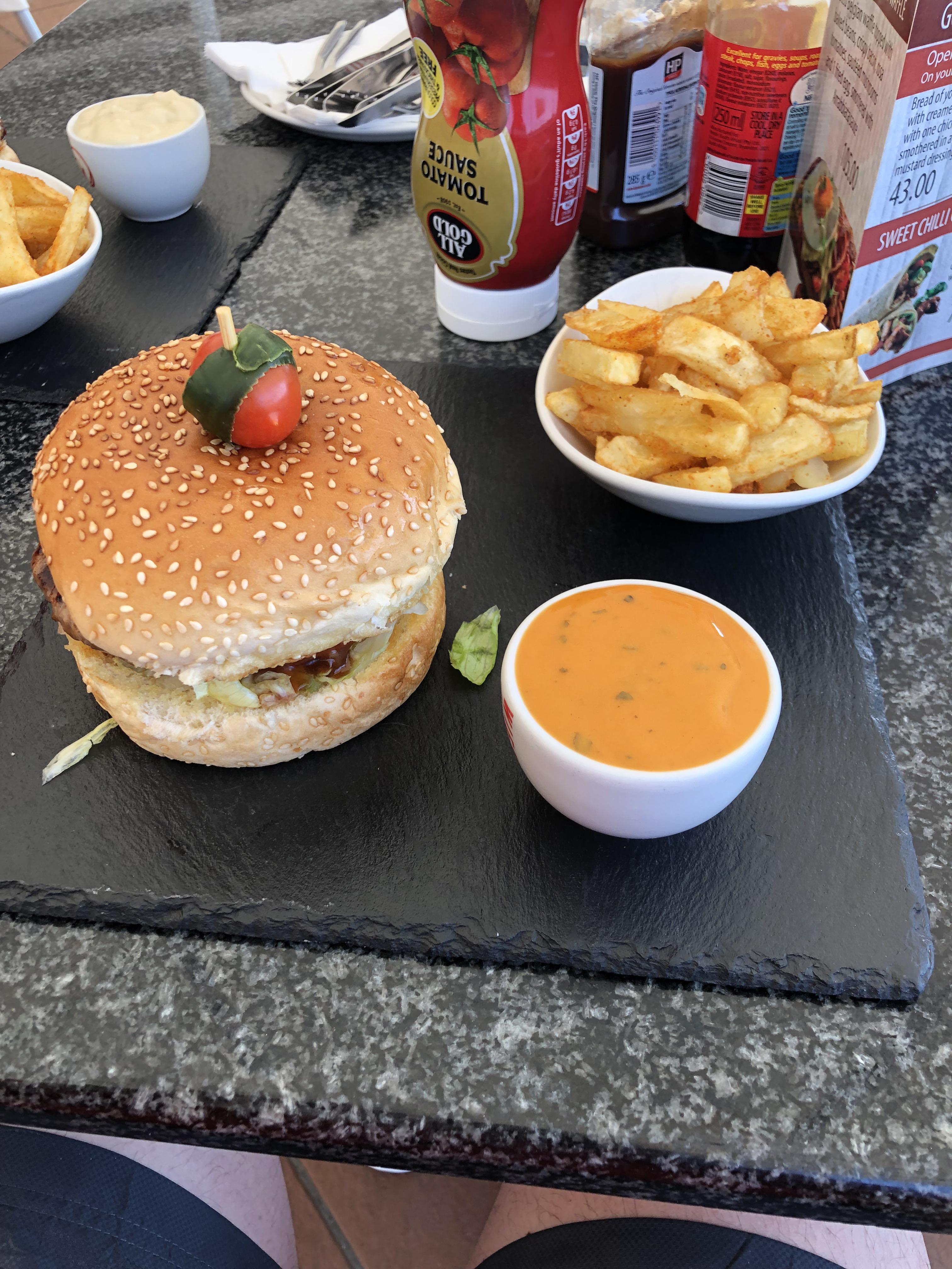 Burger served on a patio tile r/WeWantPlates