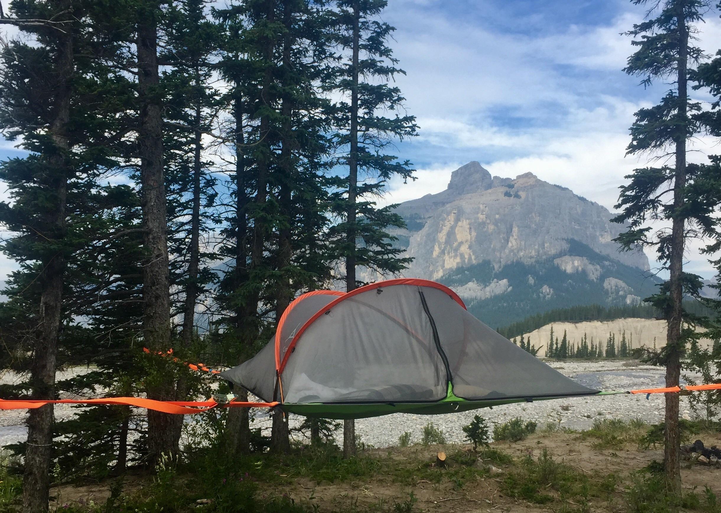 Camping this summer in the hammock tent just outside Banff National Park, Alberta. r