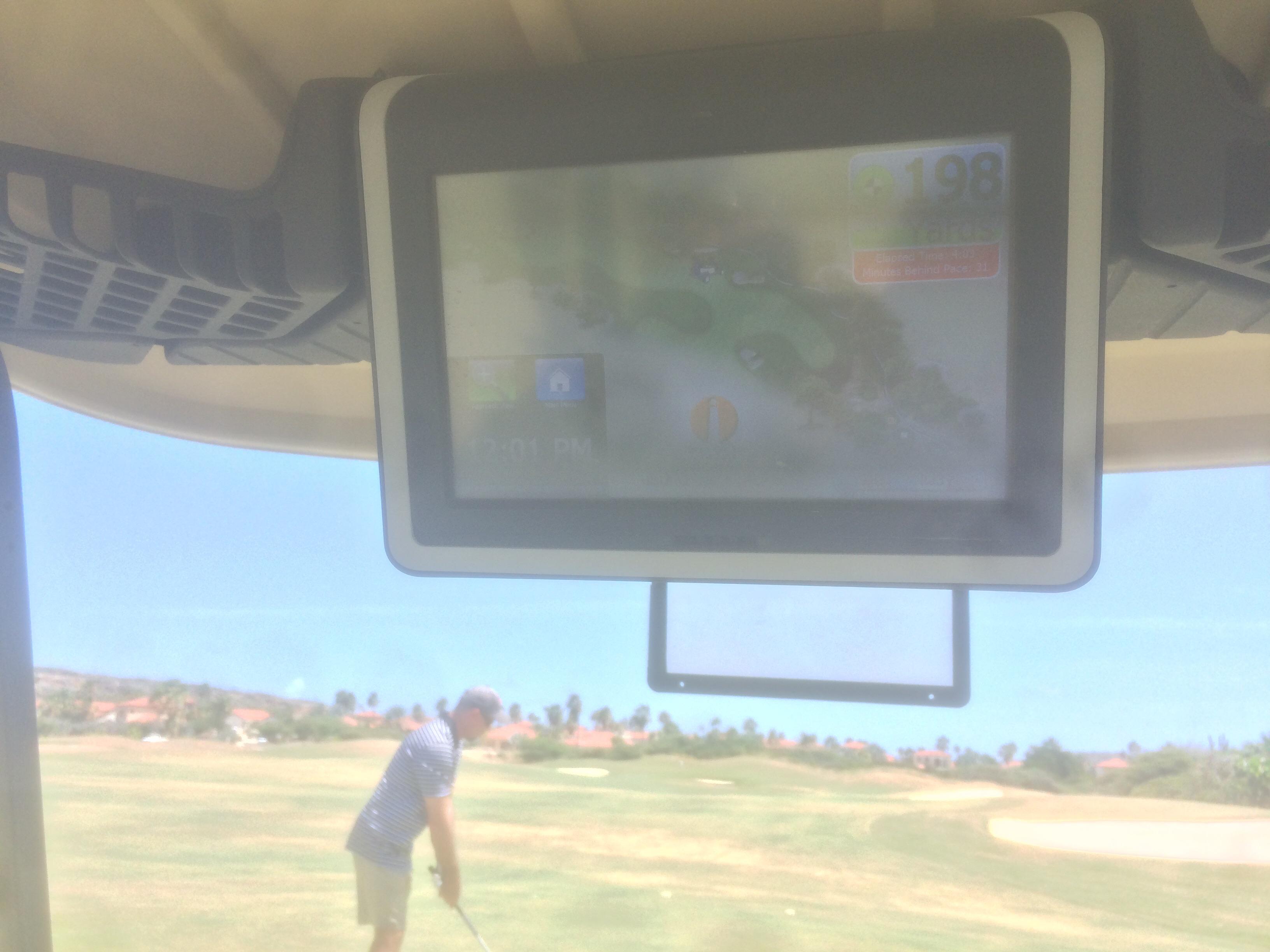 This golf cart has a touch screen that lets you know how many yards are