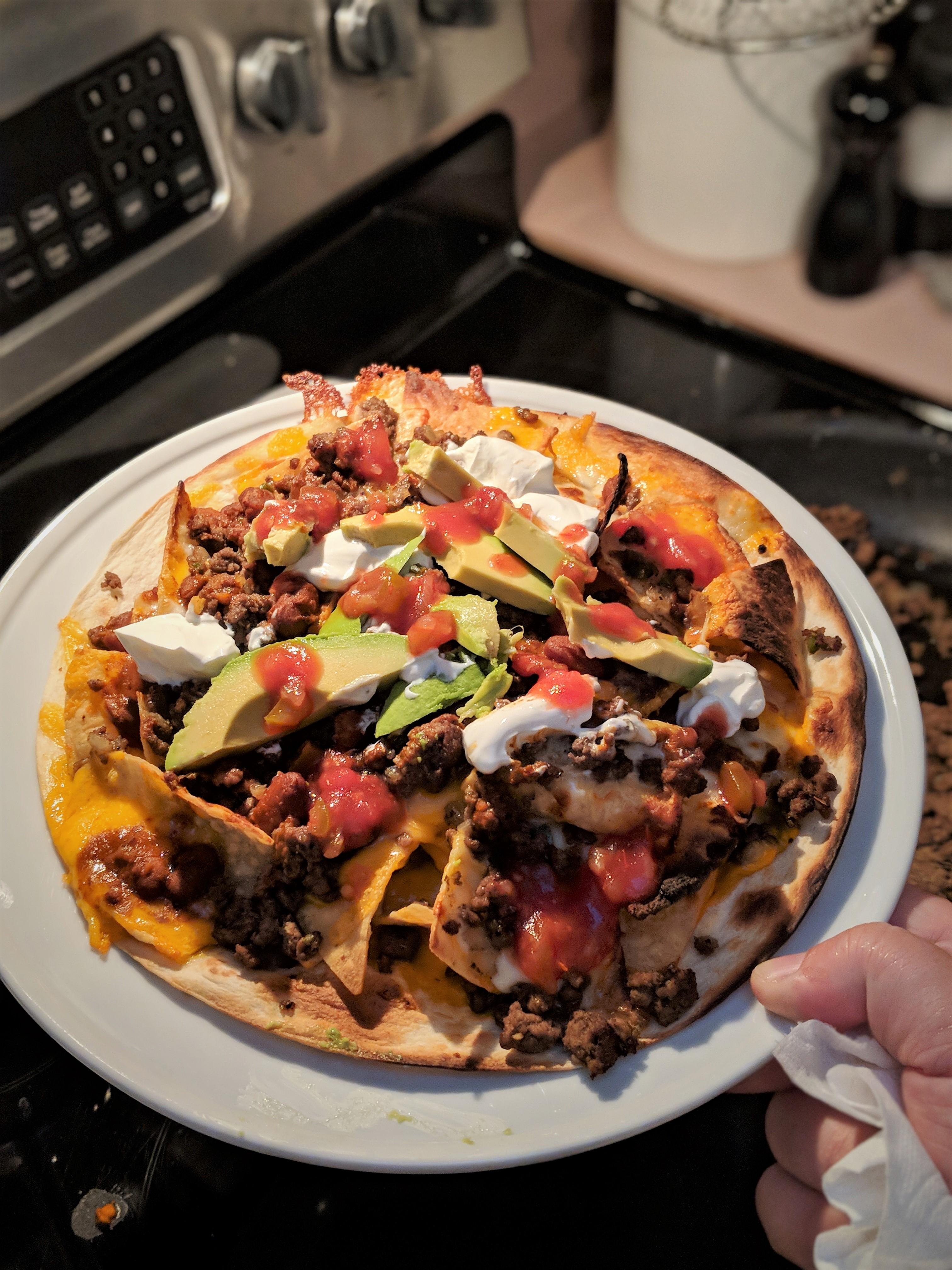 Homemade nachos on a flour tortilla ) r/nachos