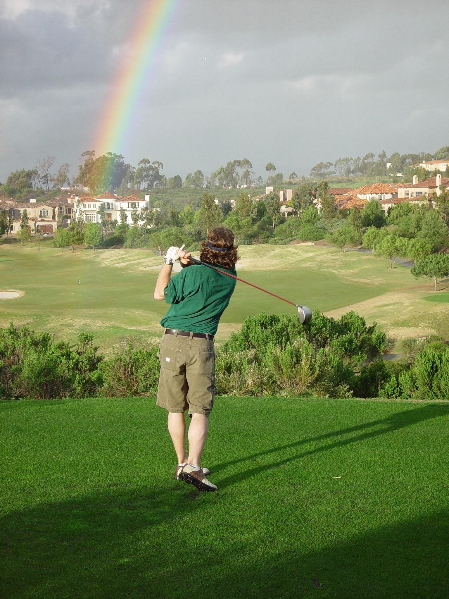 Hitting a draw around the rainbow (1536x2048) golf