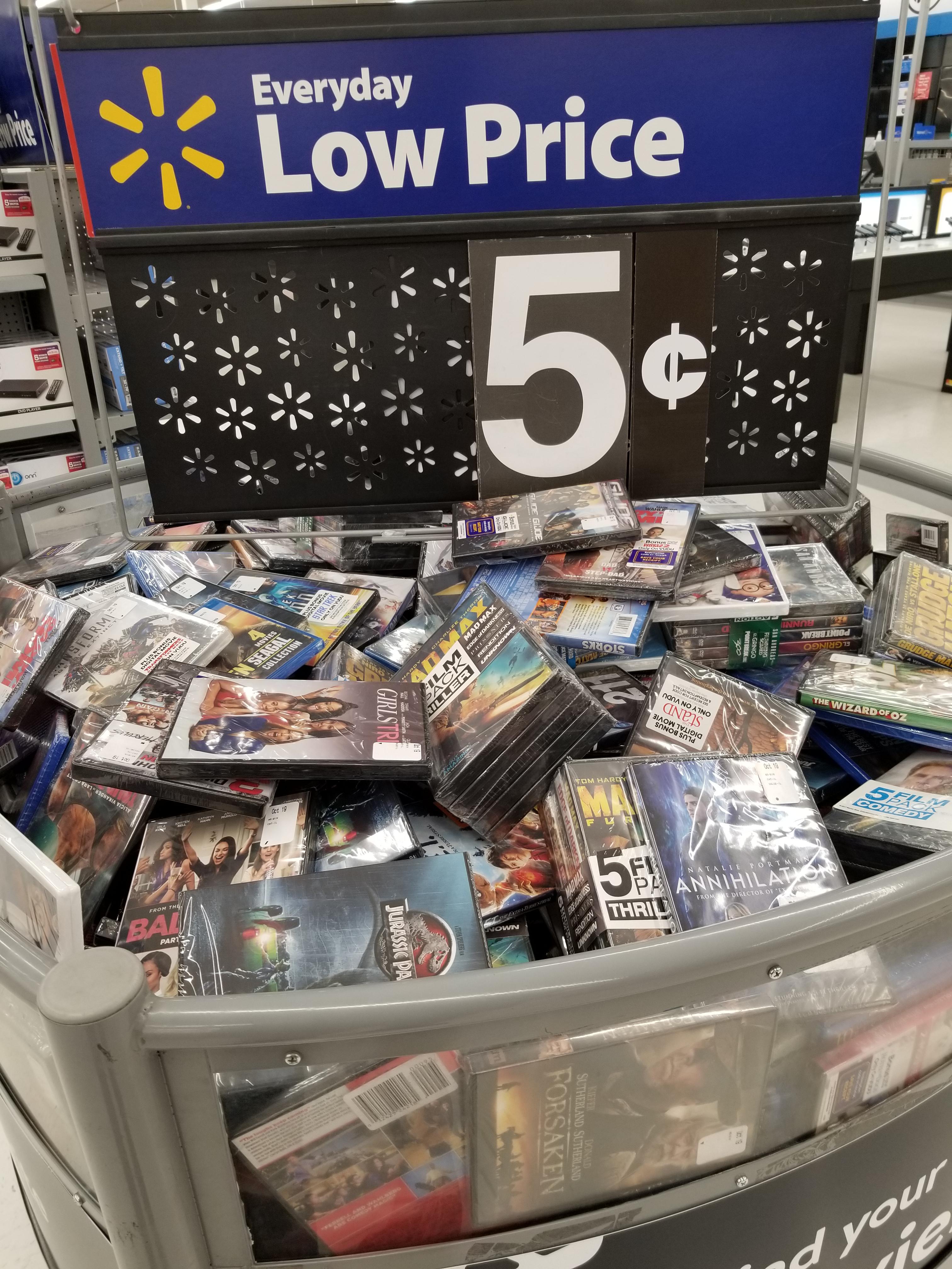 Someone flipped the sign to Cent sign on a Walmart DVD bin. Should I