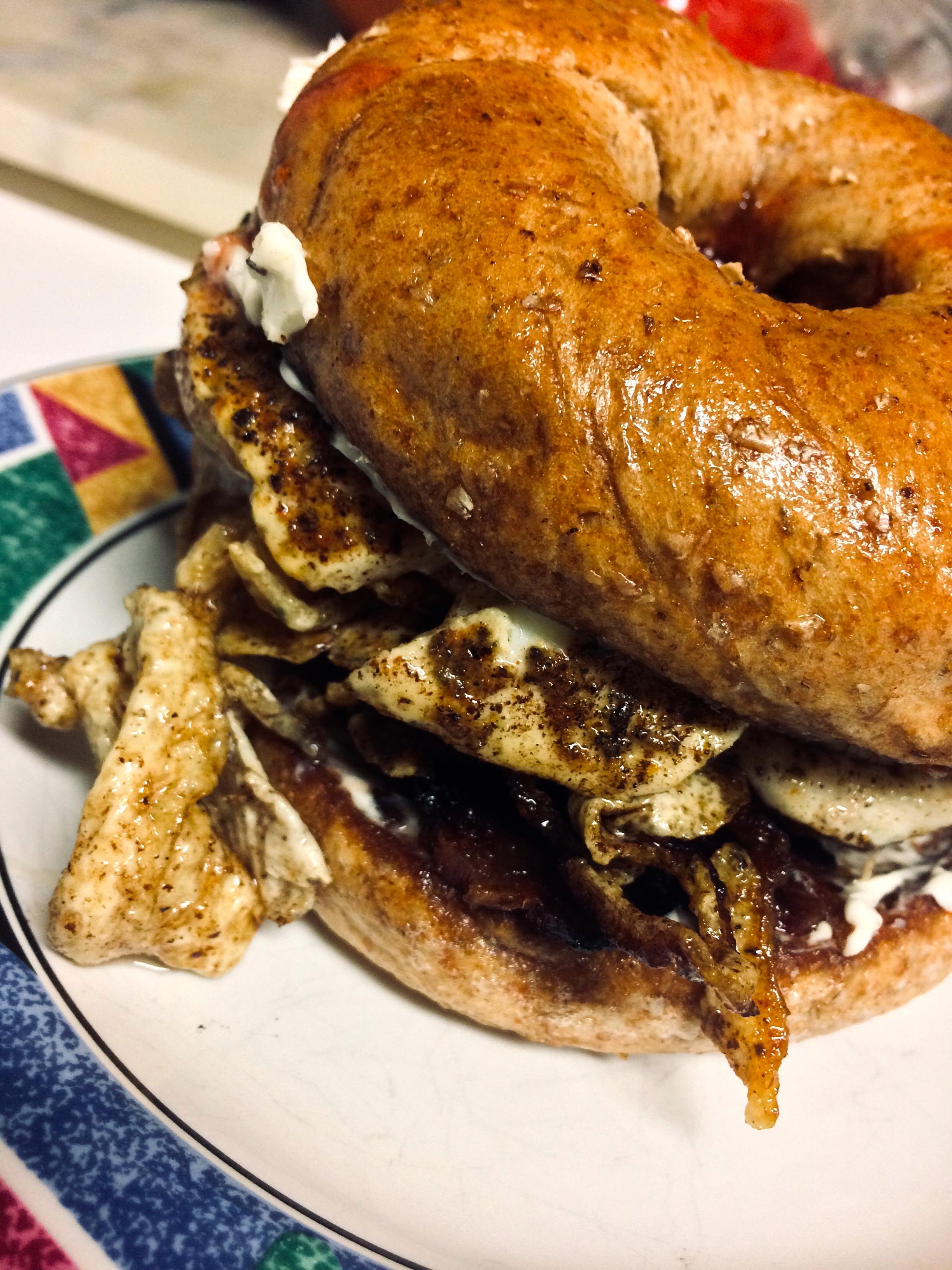 [Homemade] Buttered and toasted whole wheat bagel with cream cheese, strawberry jam, three