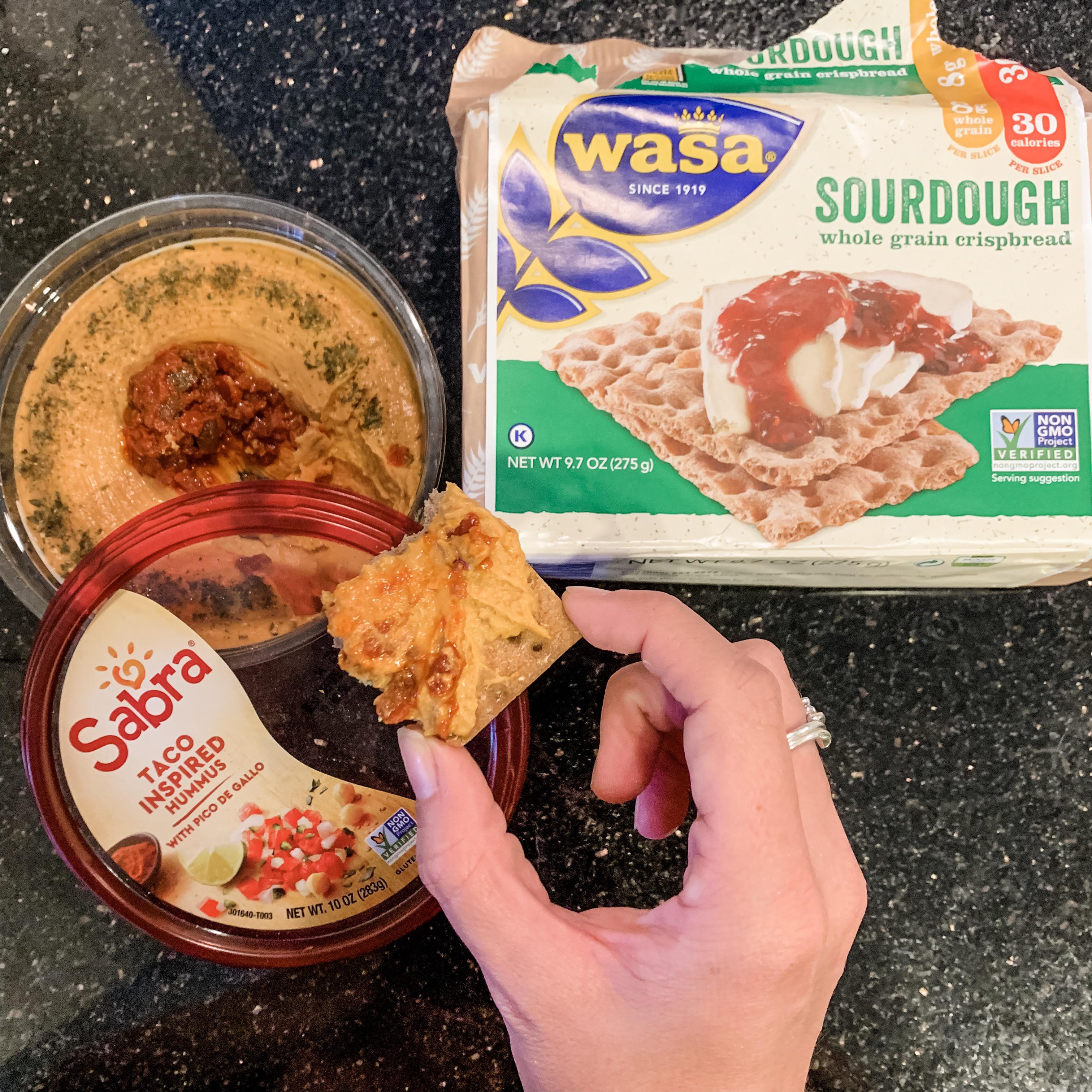 My current favorite! 2 crackers (60 cals) & 2 Tbsp hummus (70 cals)! I