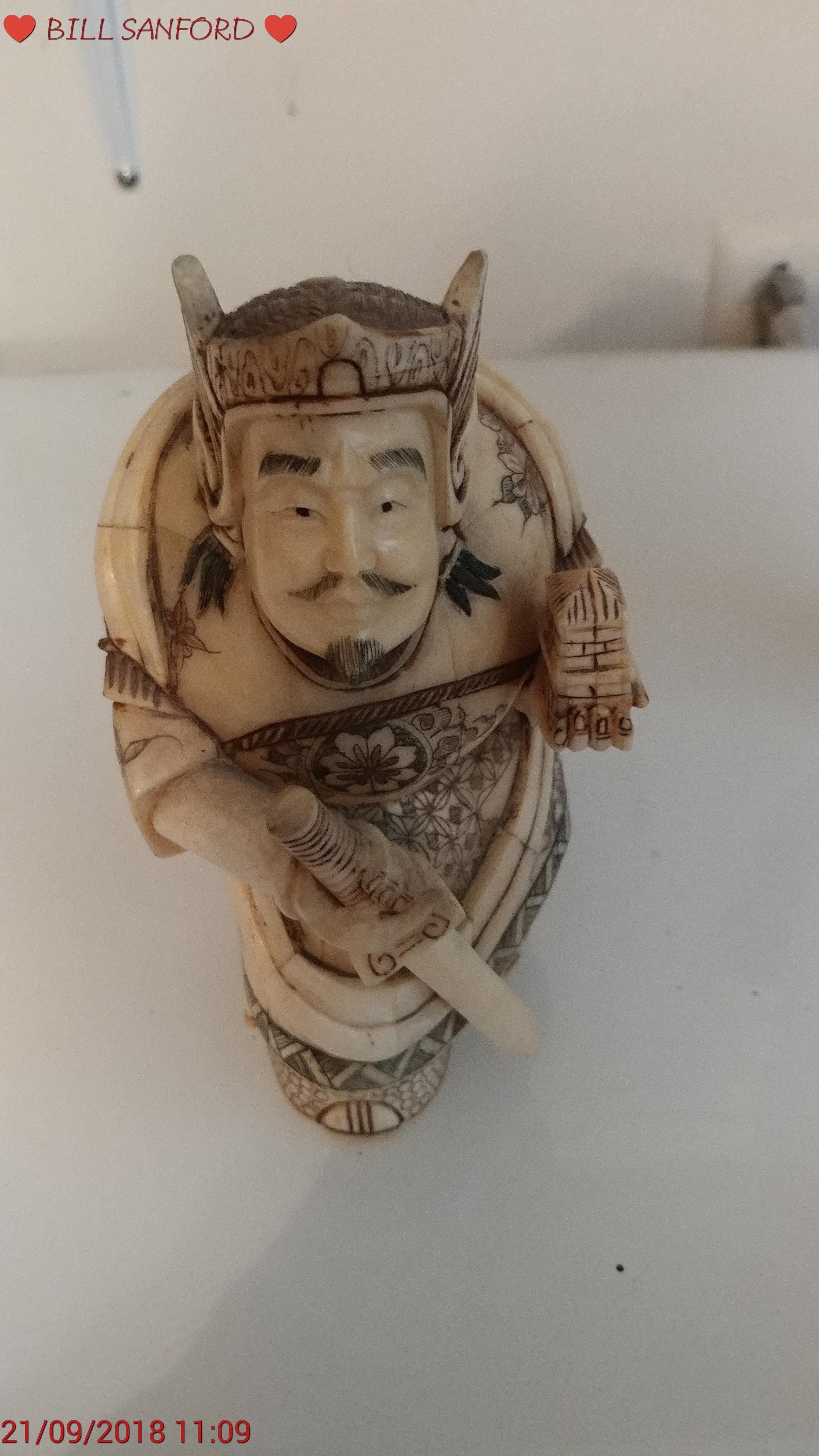 I purchased this hand carved Ivory statue nearly 20 years ago from an