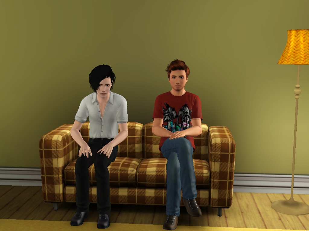 Two of my sims after making out on the couch. They both look