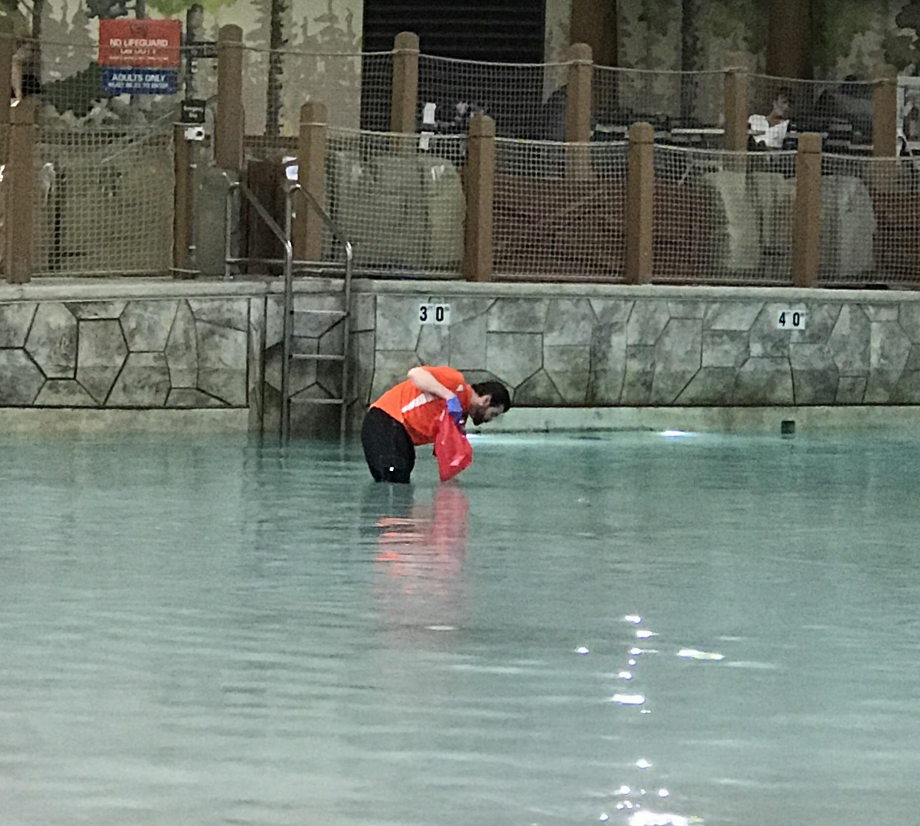 This is not what you want to see at a water park (Employee with a