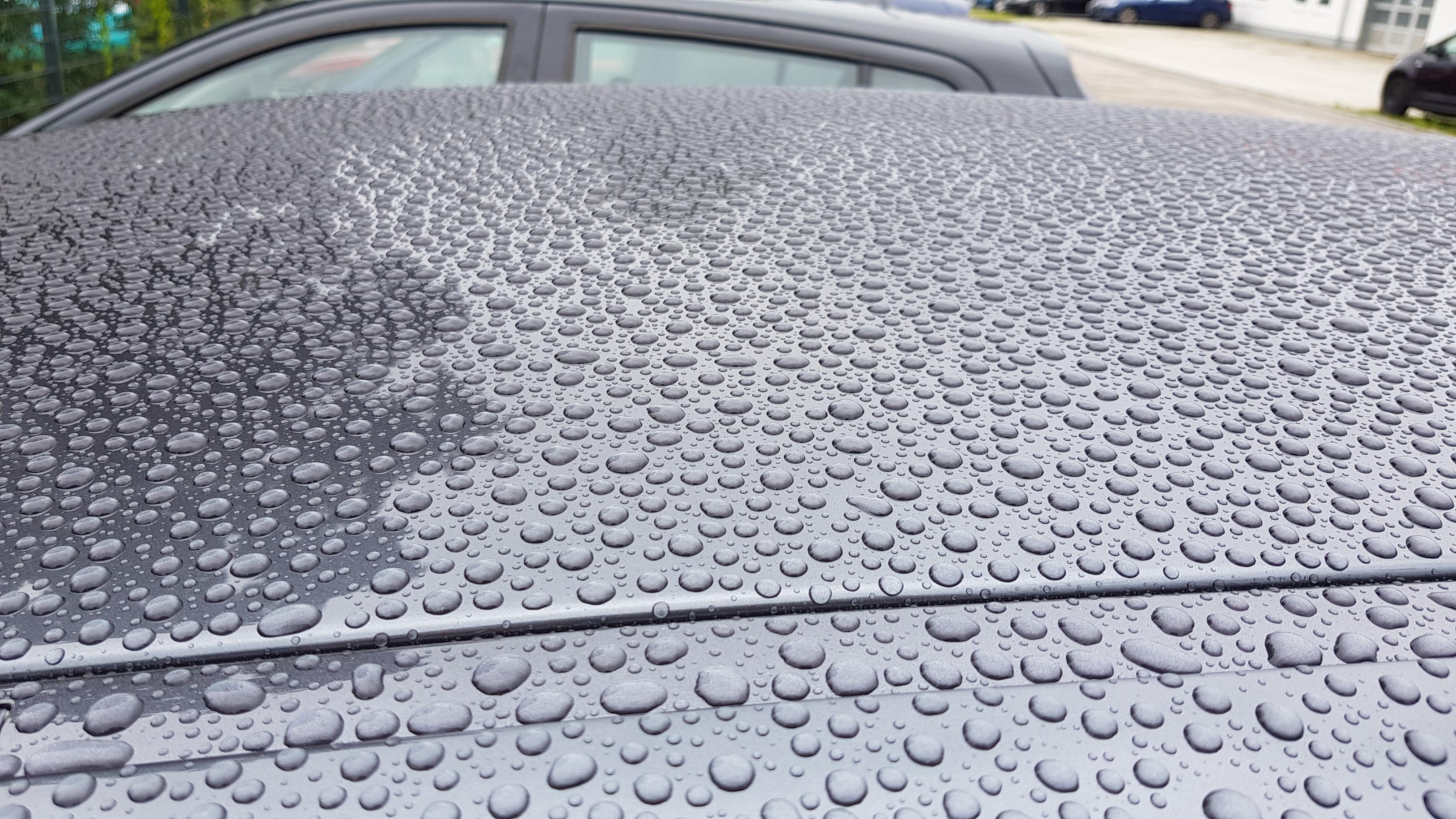 After waxing my car, the rain drops remain as big bubbles r