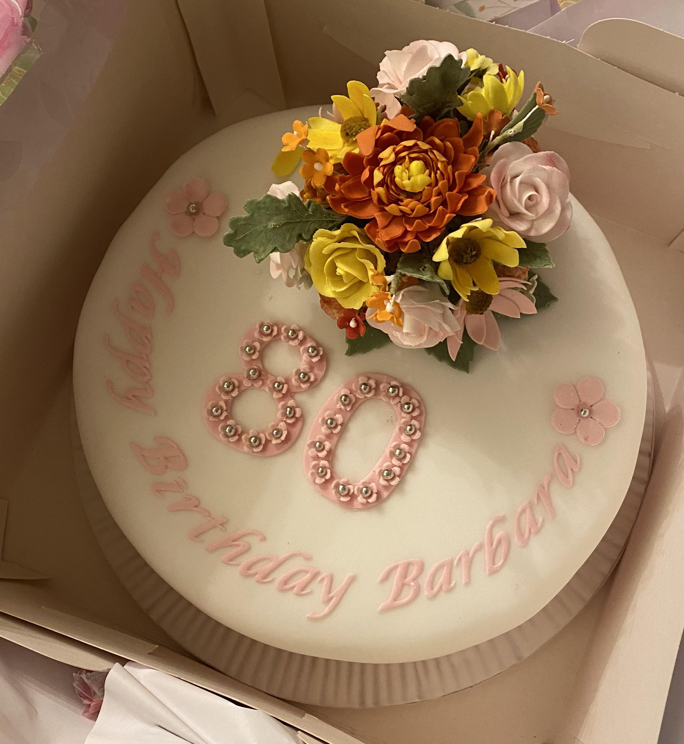 Baked a cake for my nans 80th birthday with all handmade edible flowers