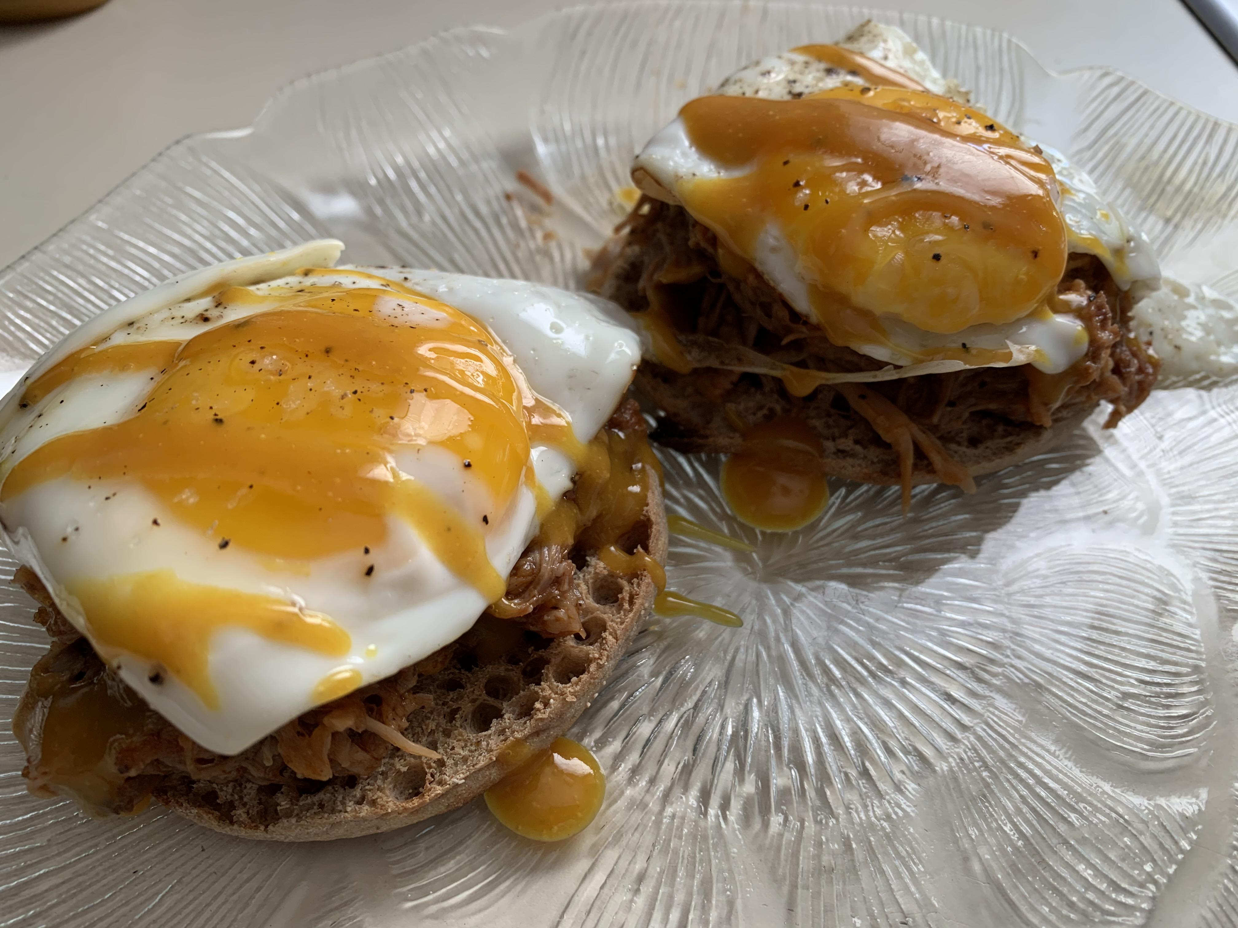 Open faced egg sandwich with pulled pork and mustard bbq sauce