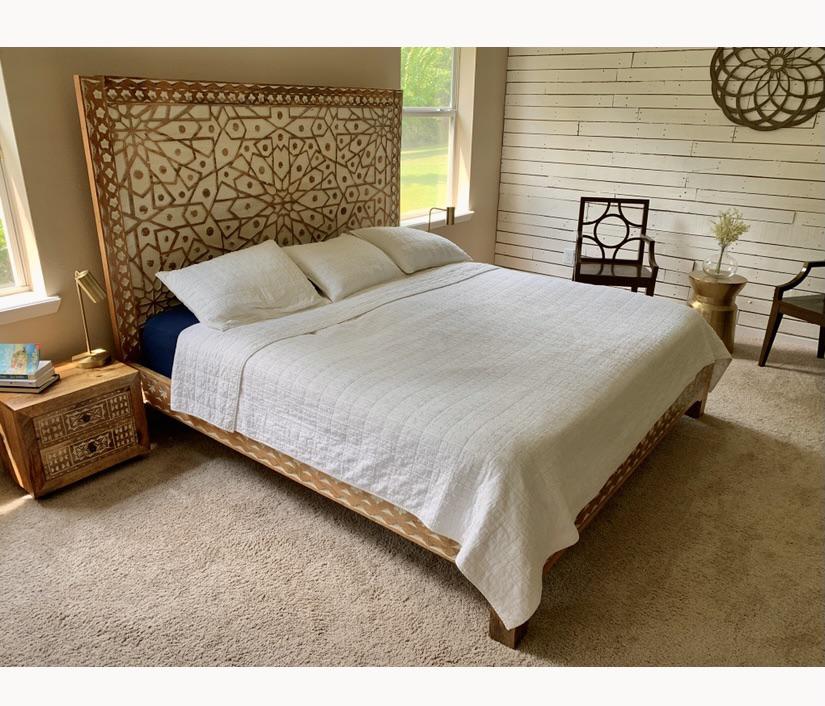 Handcarved solid mango wood bed and nightstands. Ordered these from