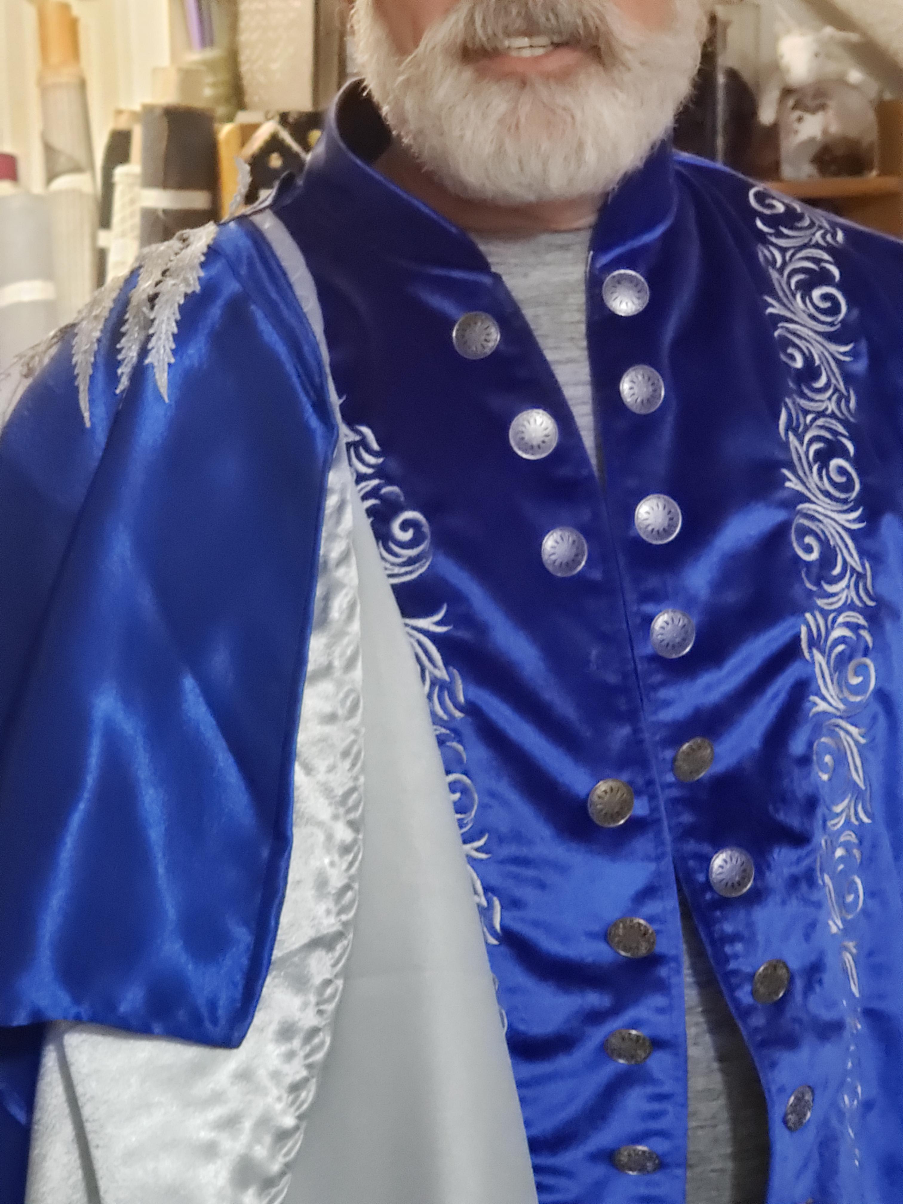 Close up front of Prince Charming jacket. Royal blue velvet with peach