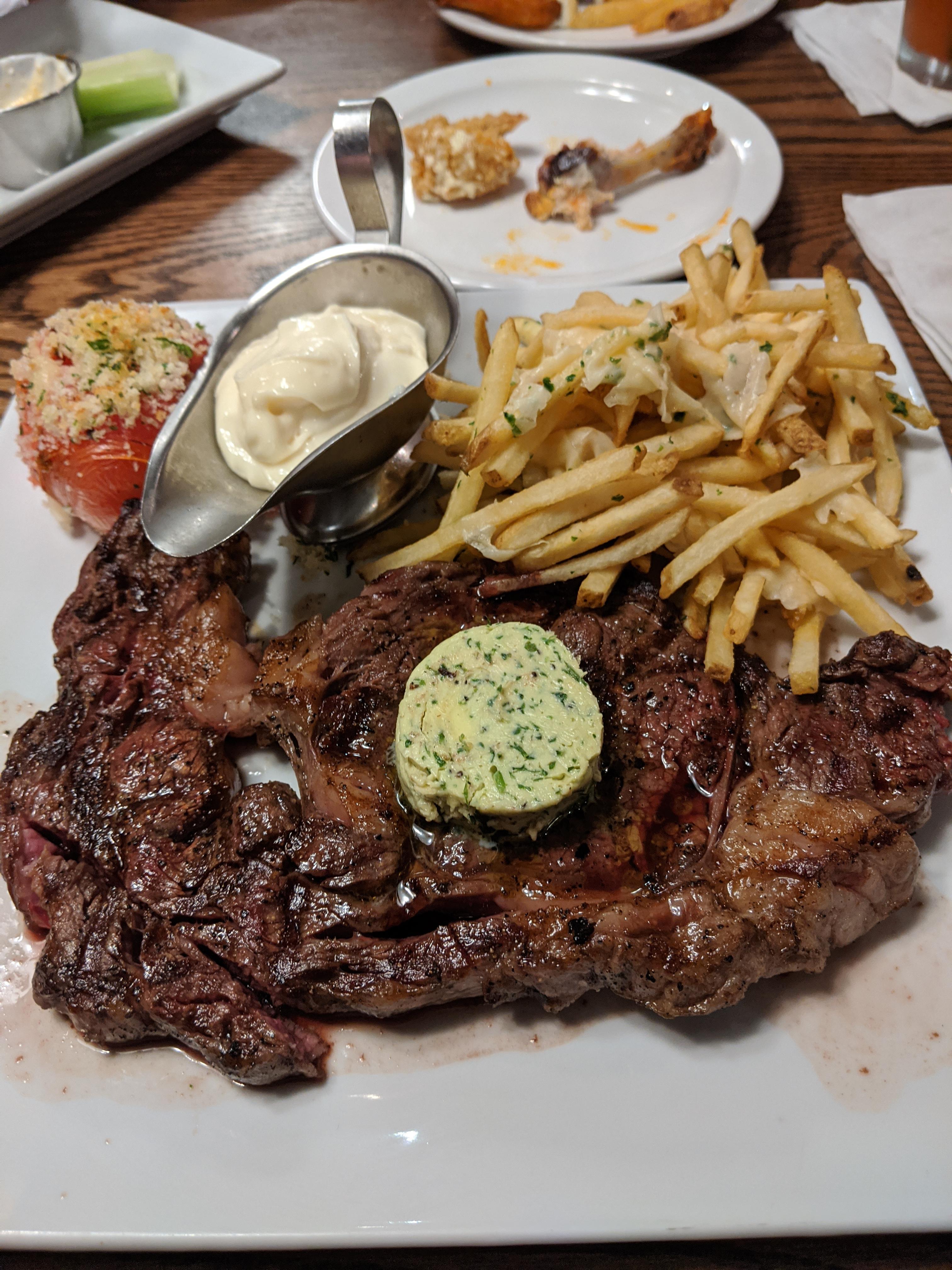 [I ATE] Charbroiled Ribeye steak with herbed butter, garlic butter