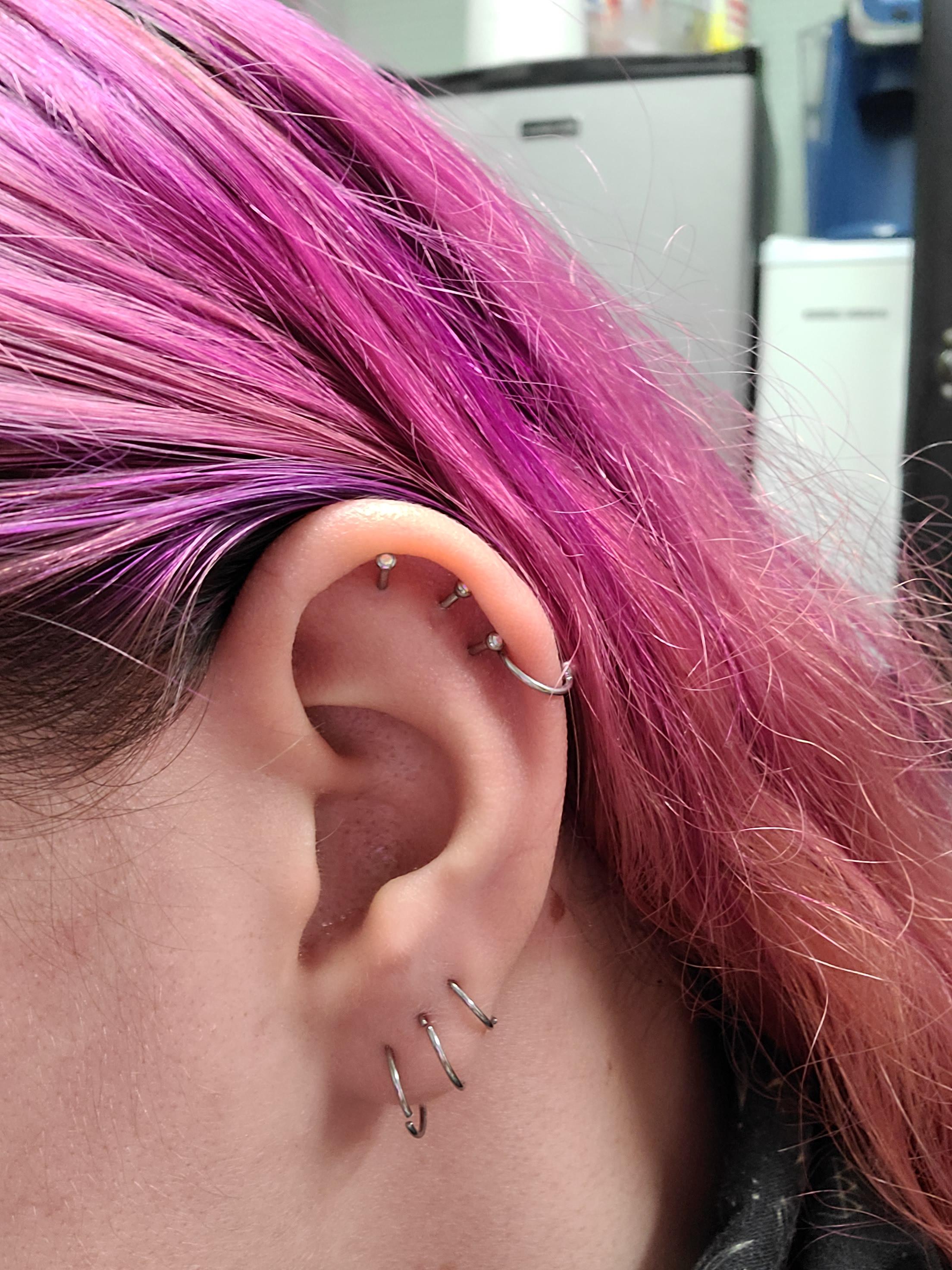 My helix piercings all migrated and now point upwards.. any jewelry