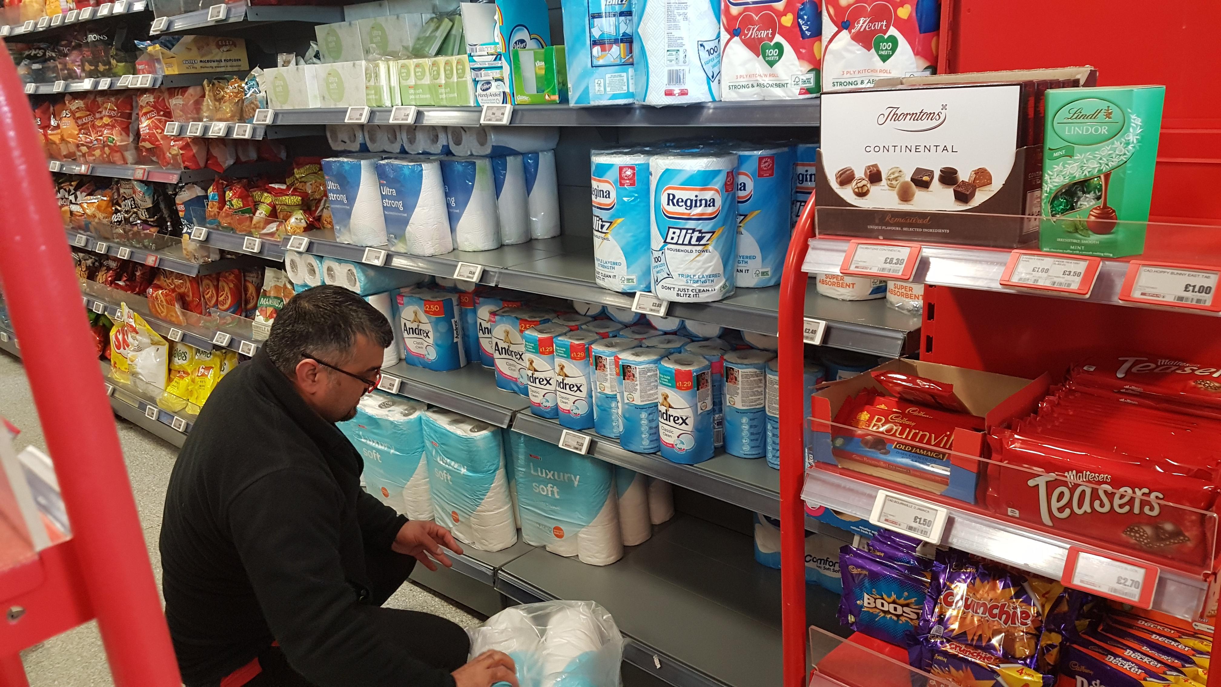 The rarest of sights, the toilet roll shelf filler outside of their