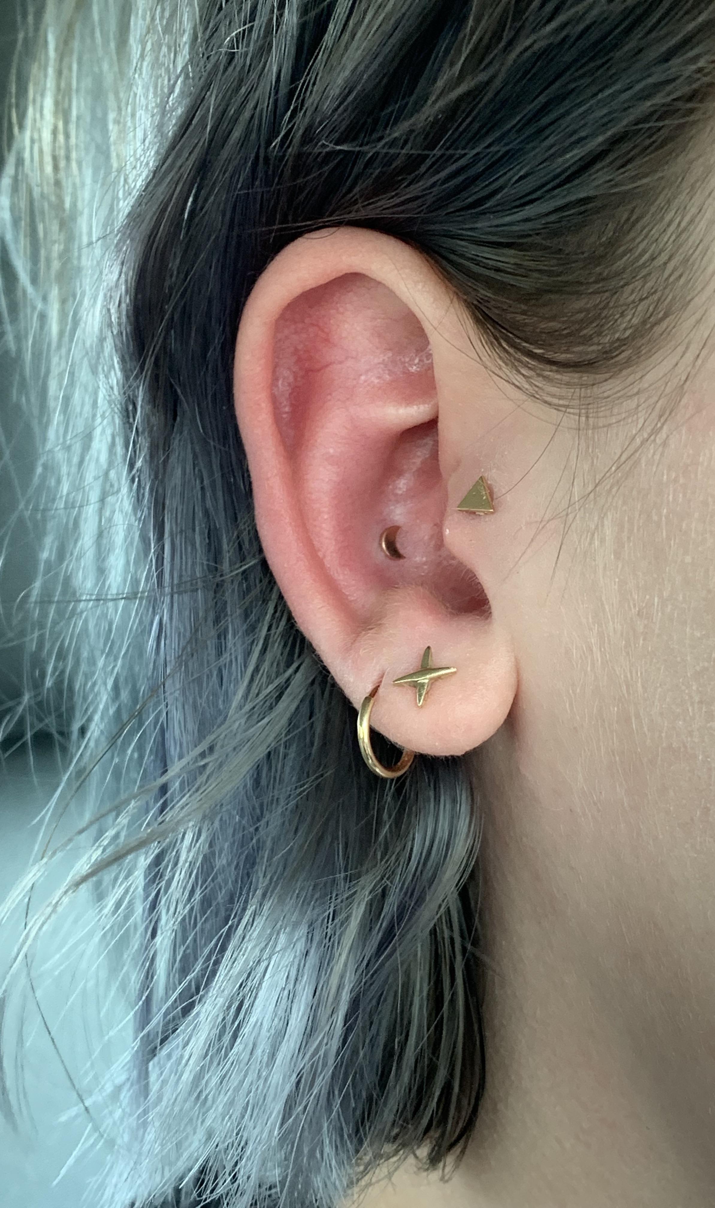 Happy first birthday to my cursed conch piercing. Maybe one day you’ll