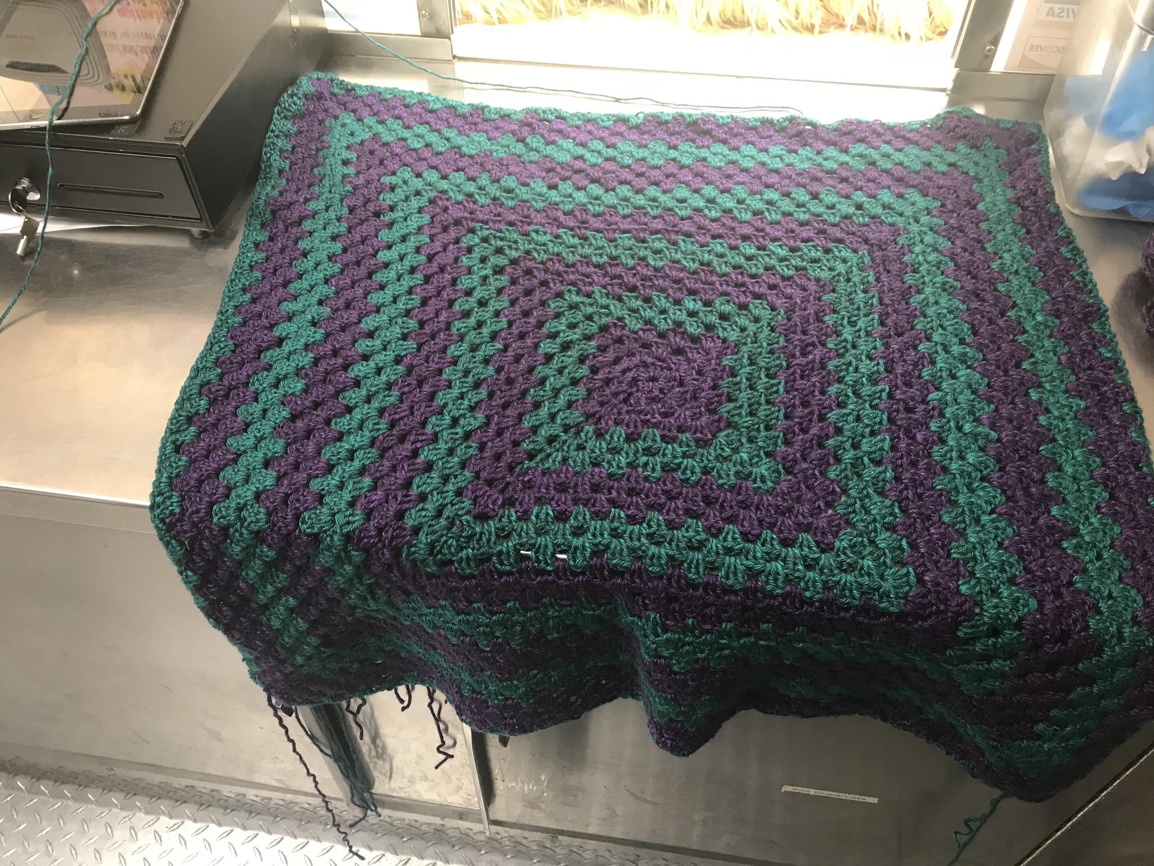 Working on my first crochet blanket, it’s basically a giant granny