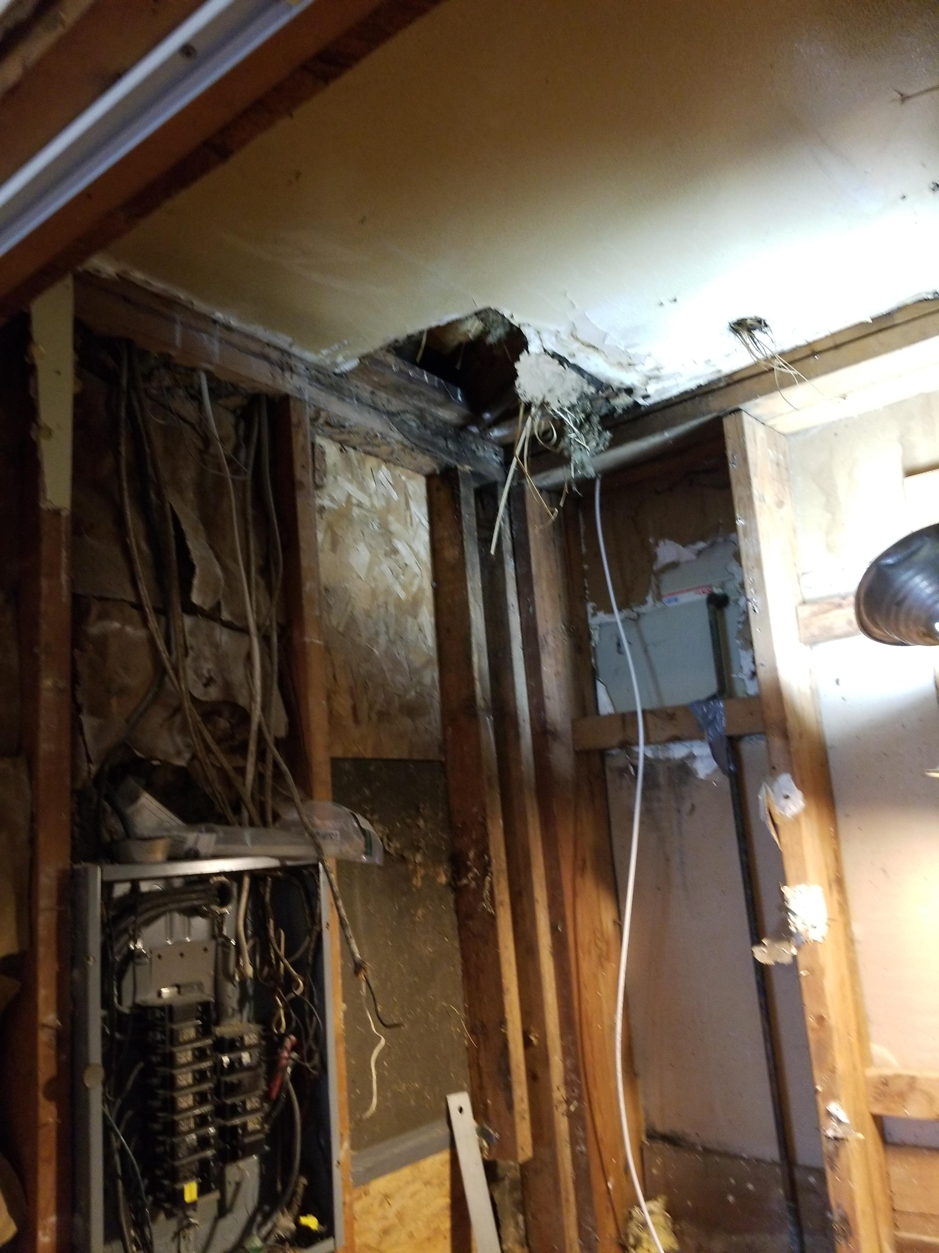 Working in crawl when ceiling collapsed, pipe from old well burst, joist broke, found a new