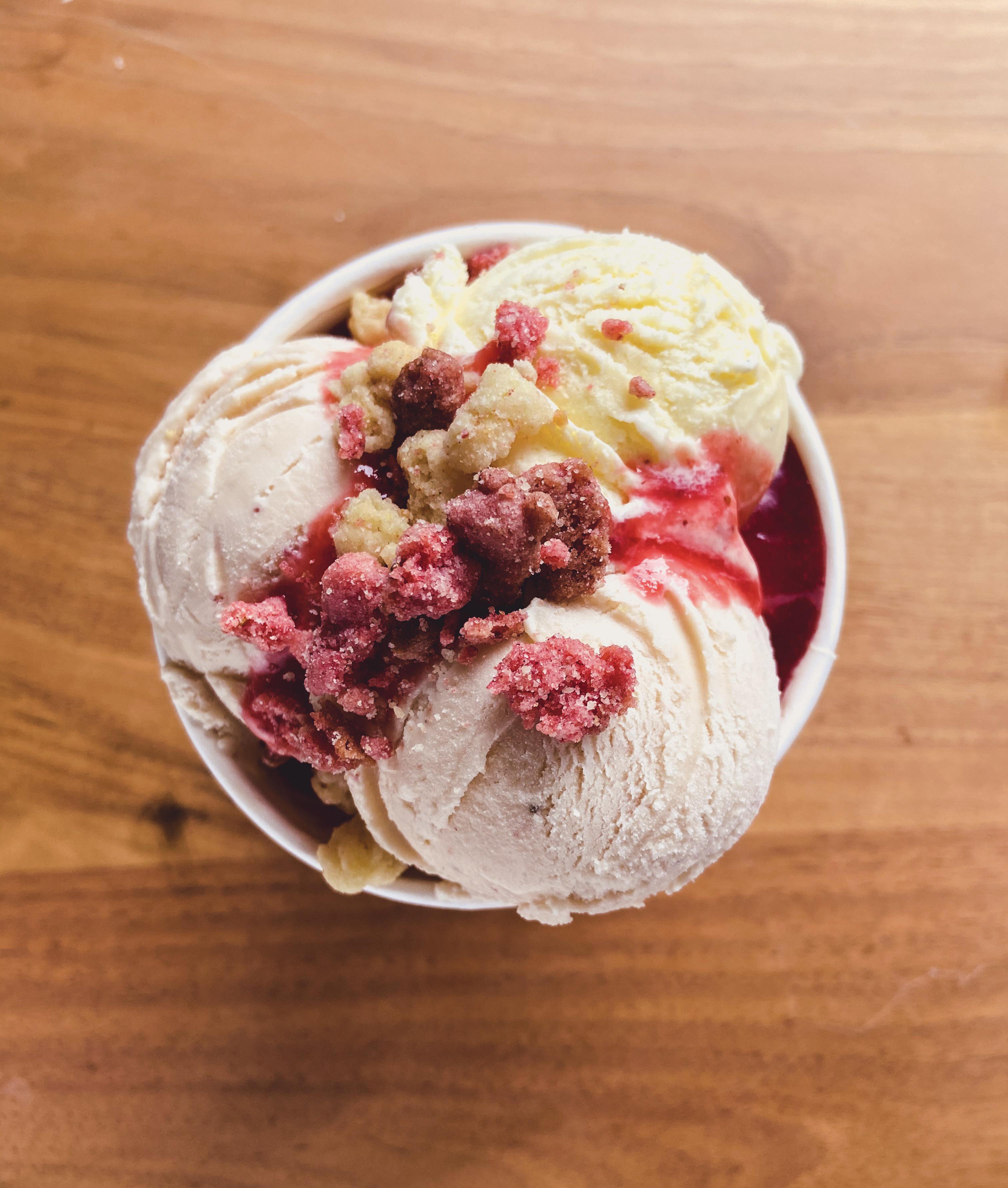 Strawberry scooter crunch strawberry and vanilla mix ice cream with a