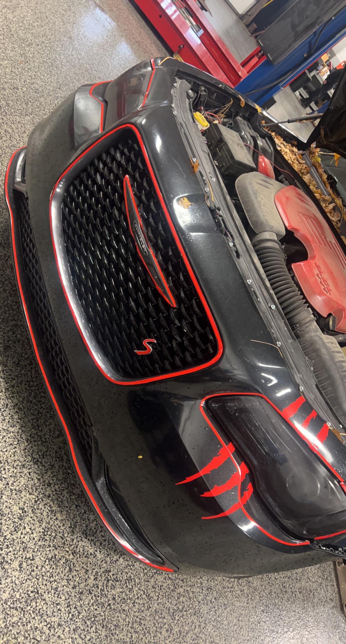 Dead battery.. All the red trim is horribly done Autozone Pinstripe