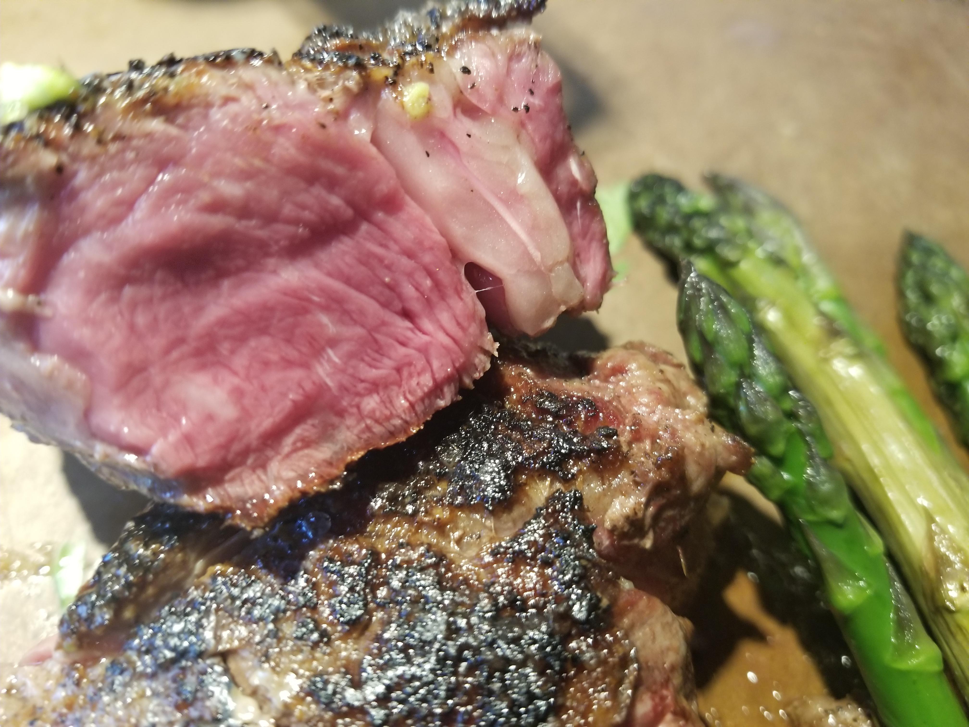 A chuck eye steak cooked from frozen. Seared on a hot pan, put it in