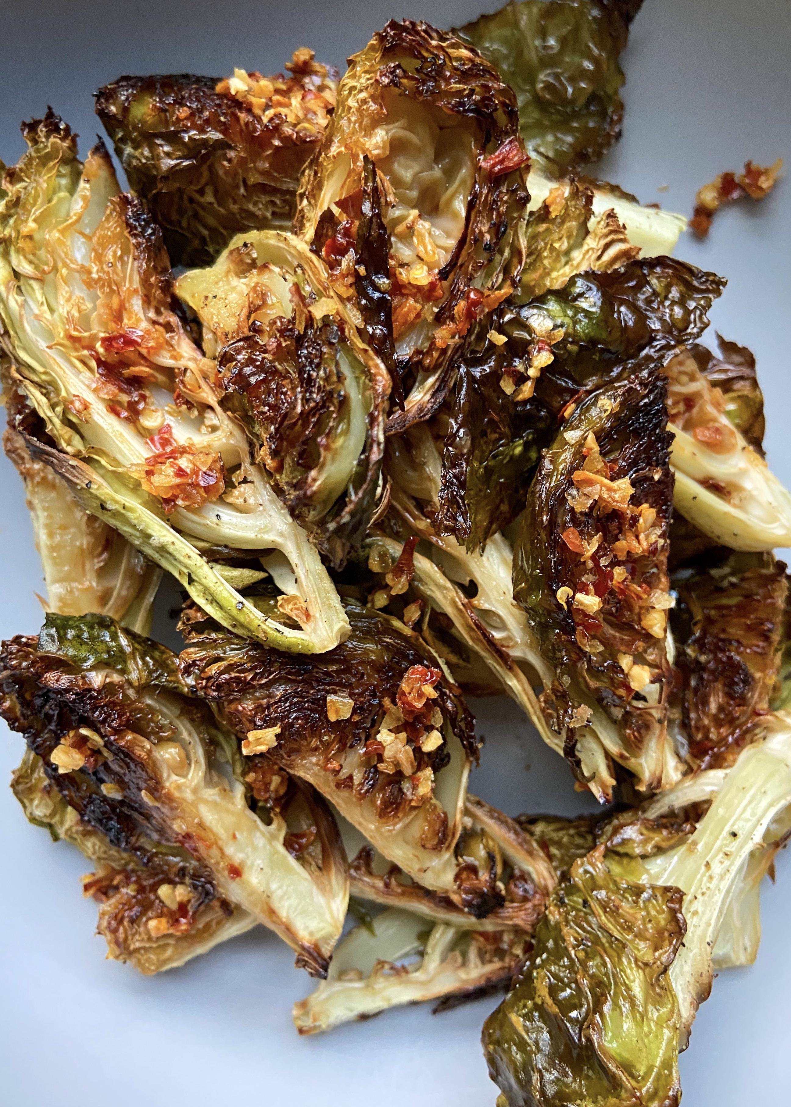 I made roasted garlic chili brussel sprouts r/veganrecipes