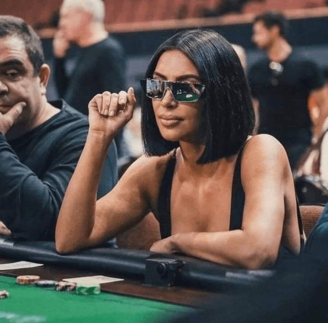 Kim Kardashian playing poker with reflecting sunglasses r/poker