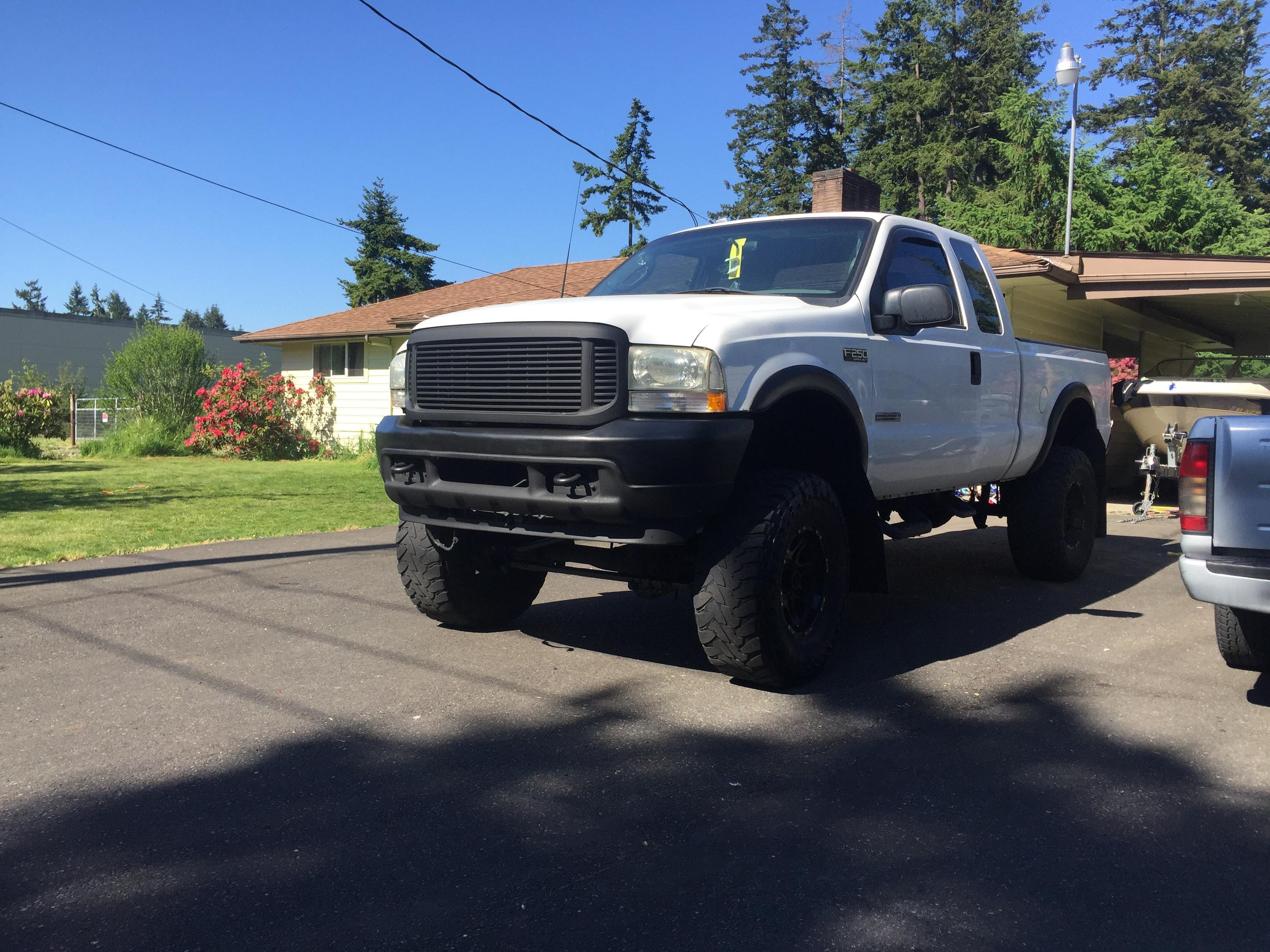 Bed liner spray on my grill and bumper. Think I like it r/Trucks