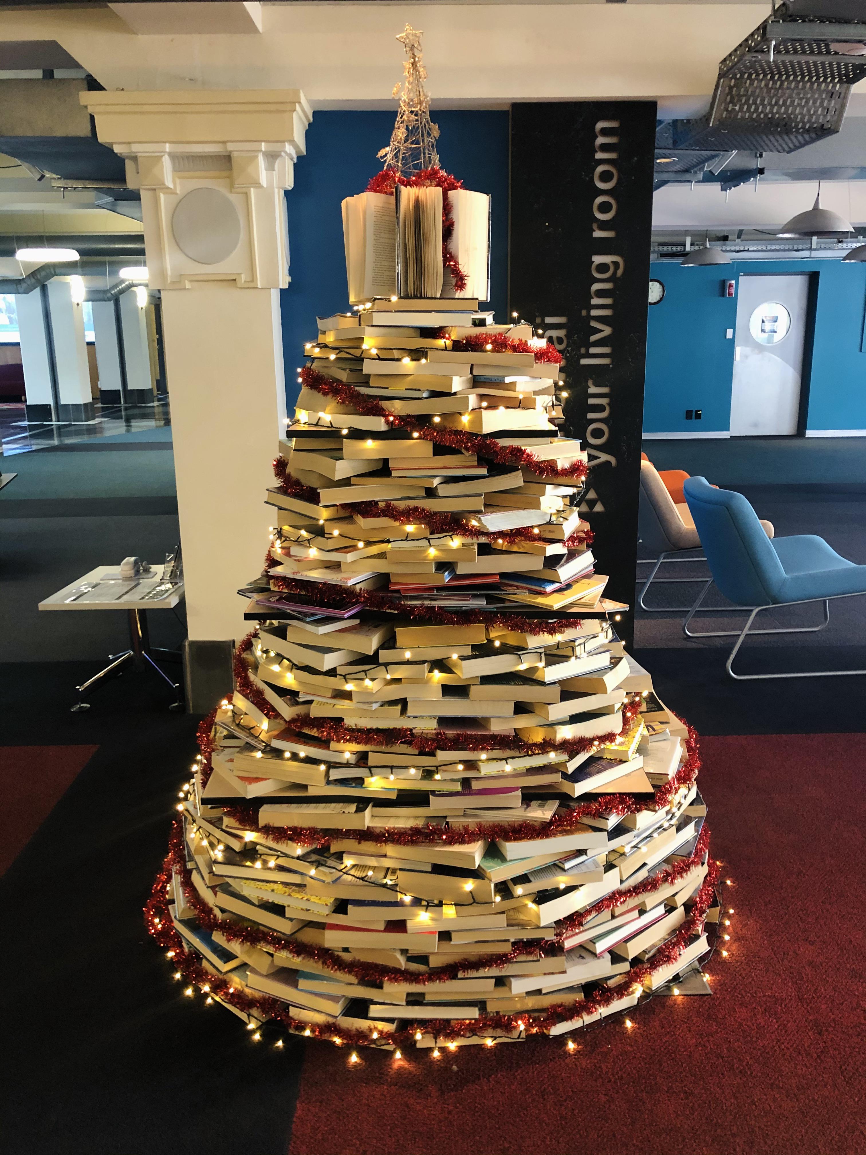 Christmas Trees Out Of Books Our town library made a Christmas tree out of books mildlyinteresting