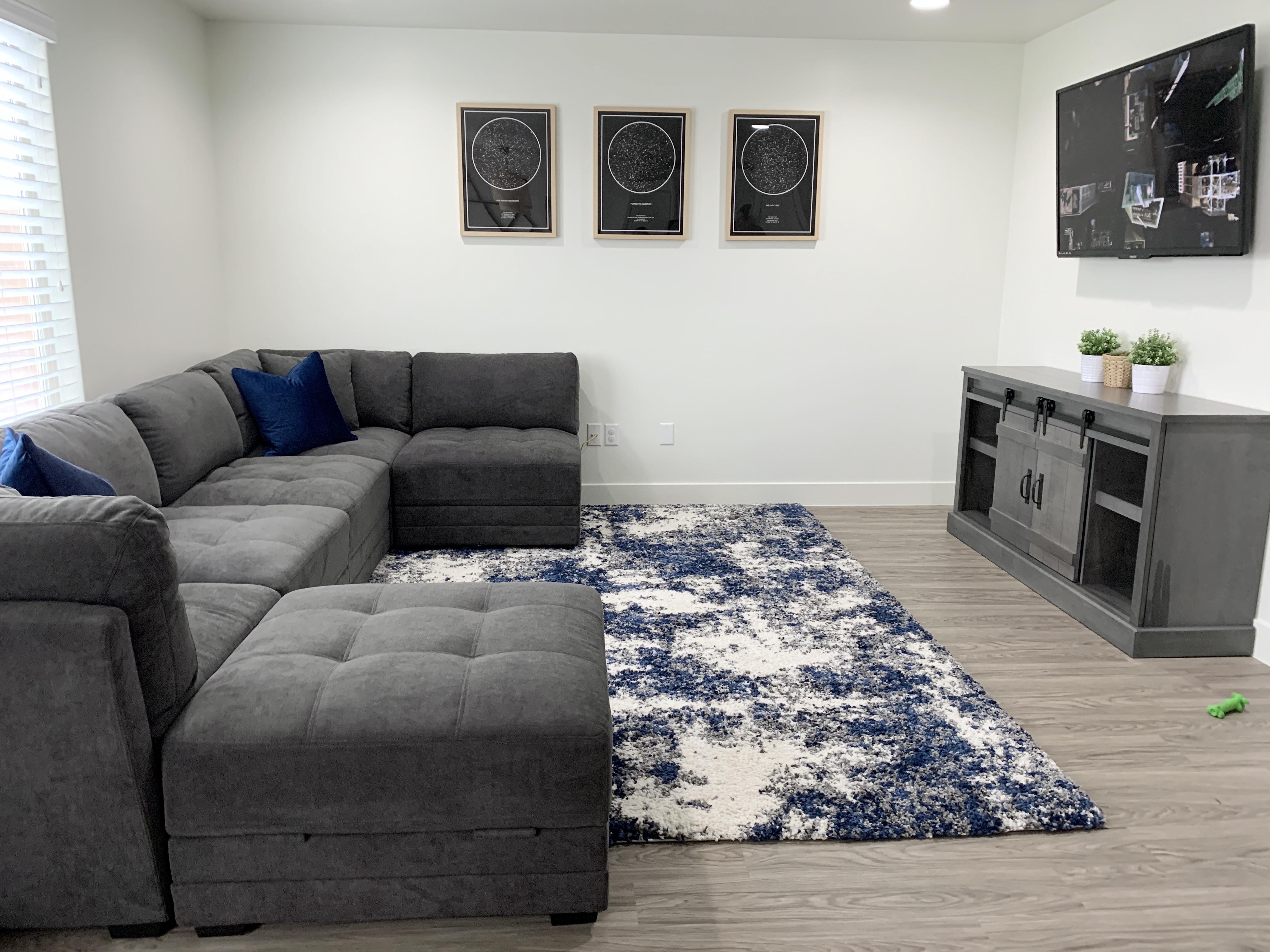 New couch and rug. The rug is so thick and comfortable it feel like