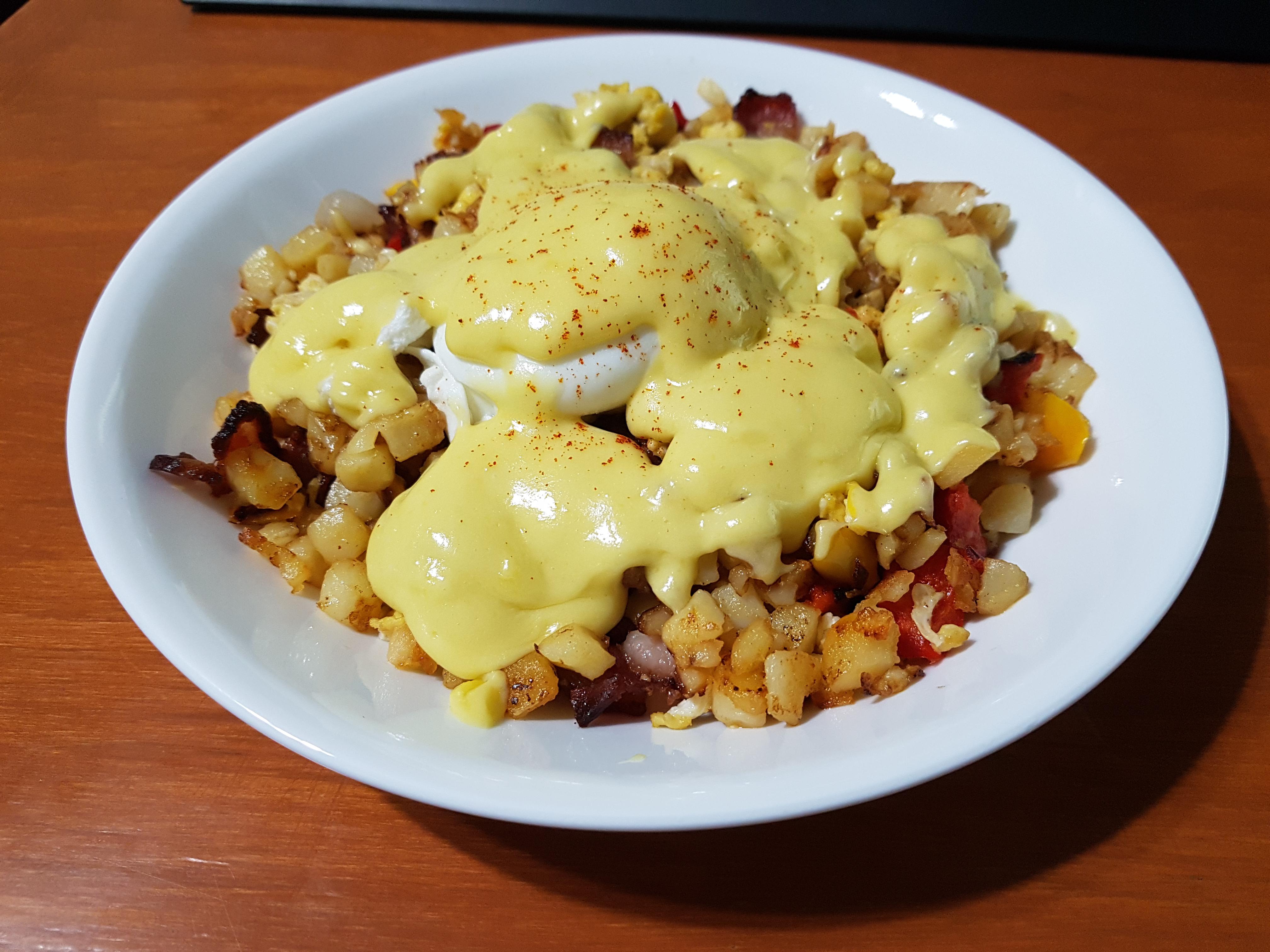 Breakfast Poutine. Hashbrowns, peppers, onions, scrambled egg, and