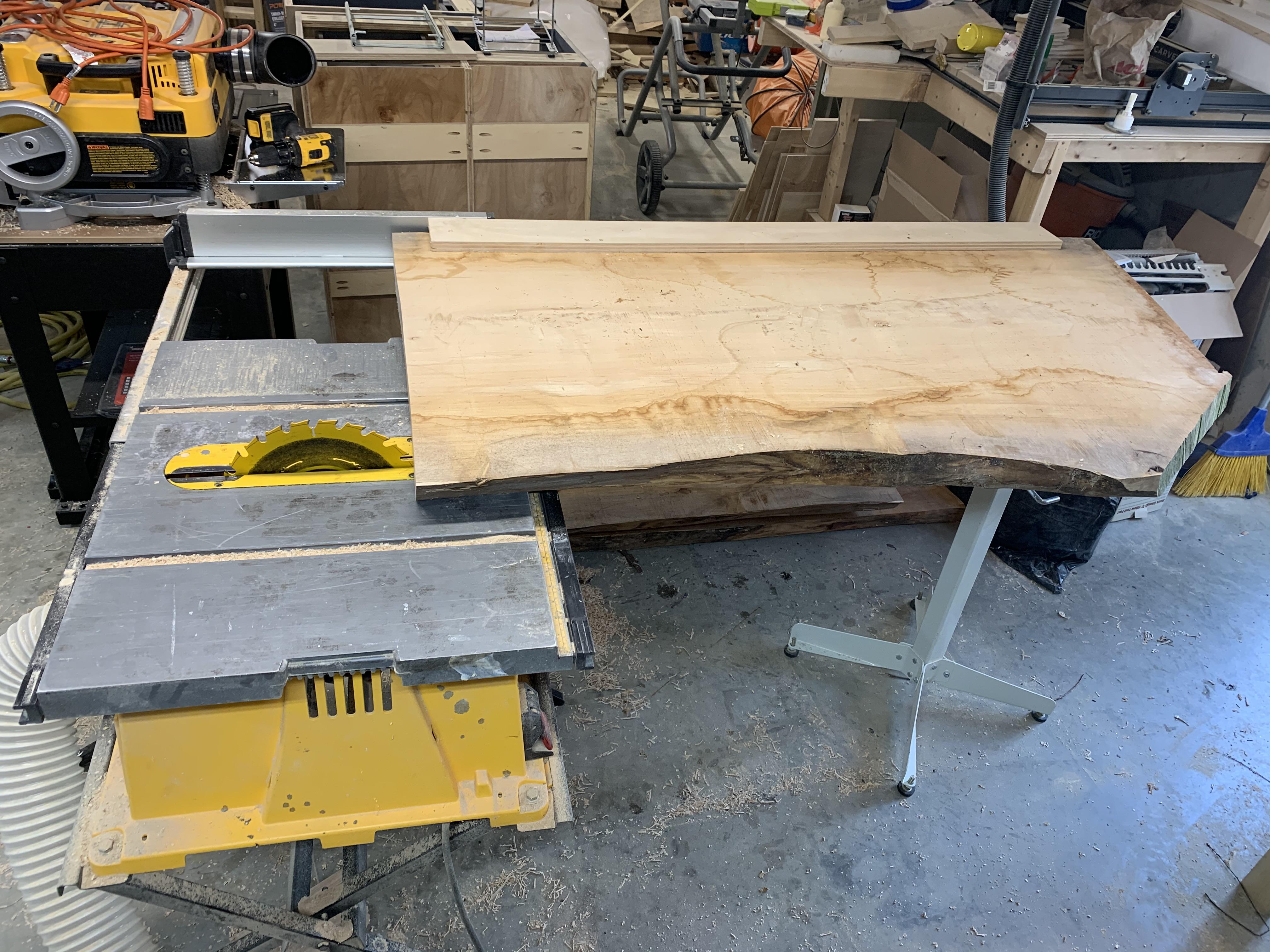 For those that ever wondered how you cut a straight edge from slab wood