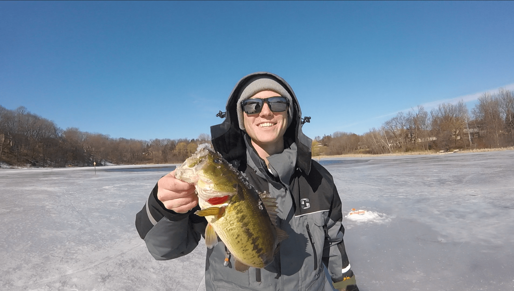 Throwback to my first Largemouth Bass through the ice! r/Fishing