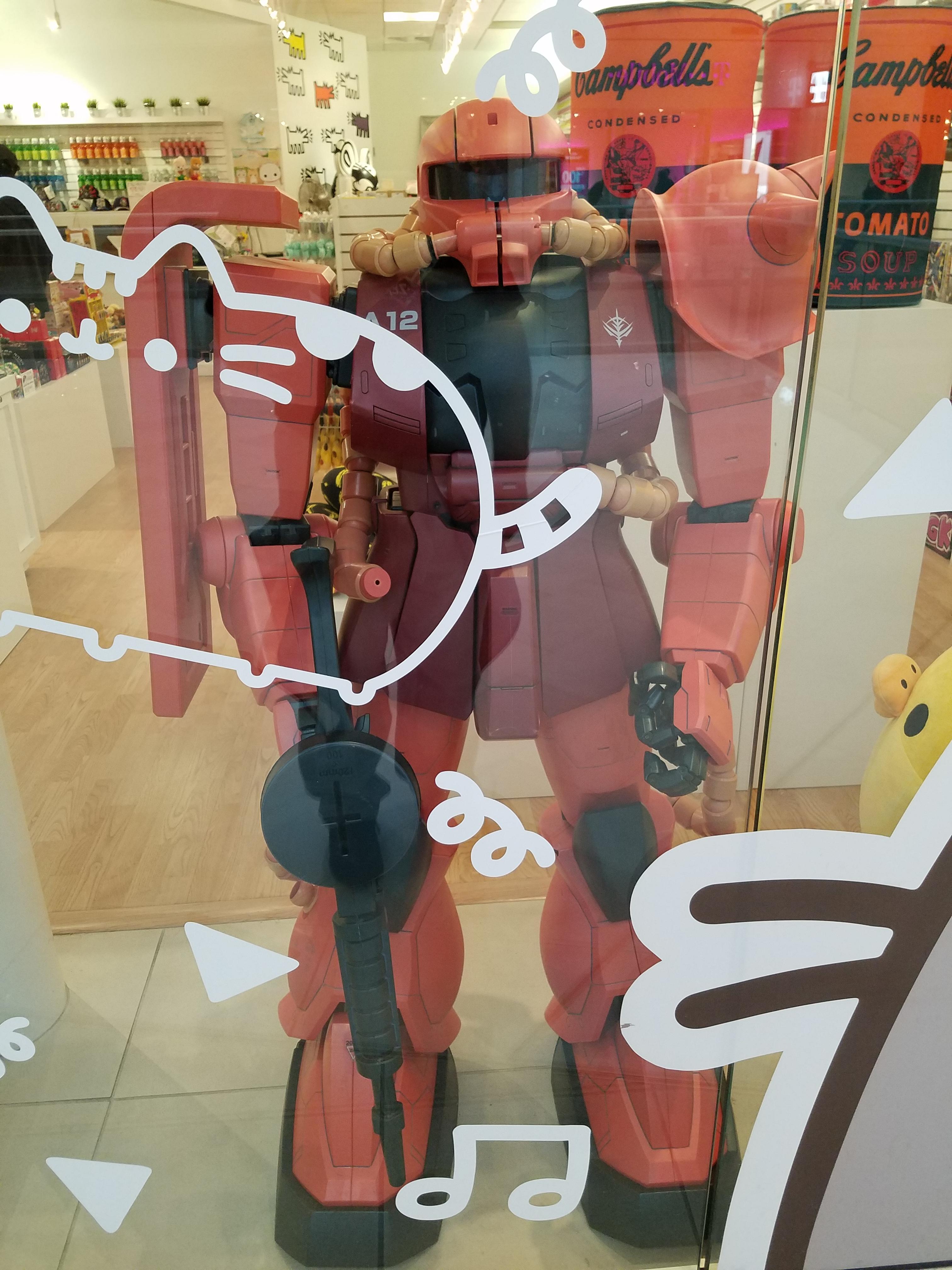 Large Gundum model at a store called Tomodachi in Mall of