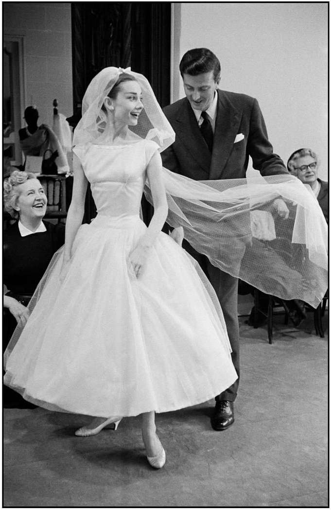 Audrey Hepburn during the production of “Funny Face”, with designer